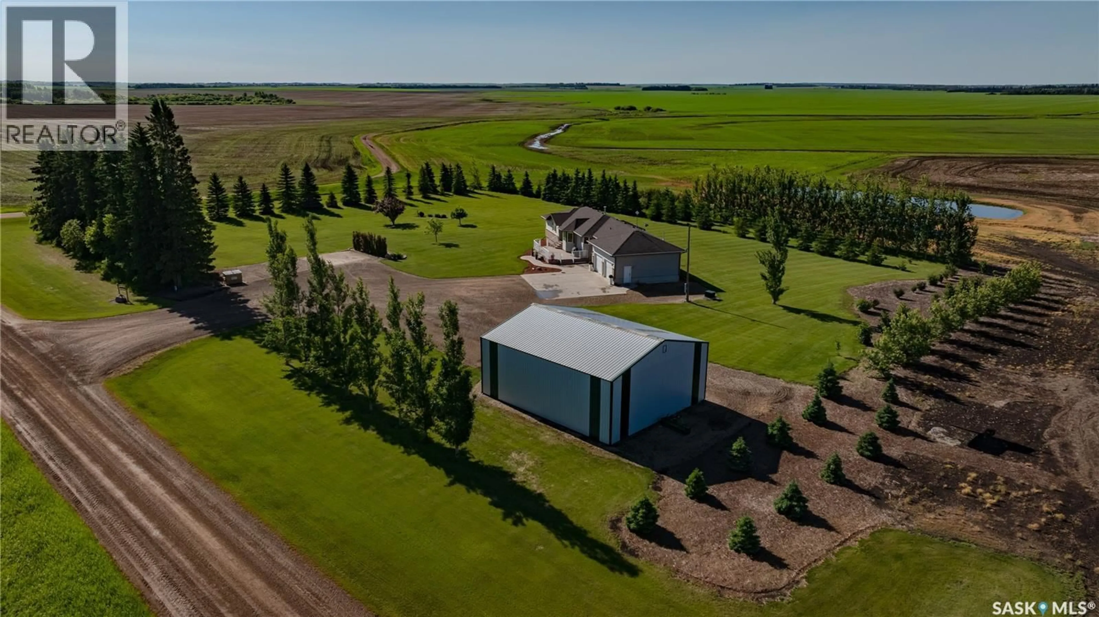 A pic from outside/outdoor area/front of a property/back of a property/a pic from drone, building for HIEBERT ACREAGE, Willow Creek Rm No. 458 Saskatchewan S0E1A0