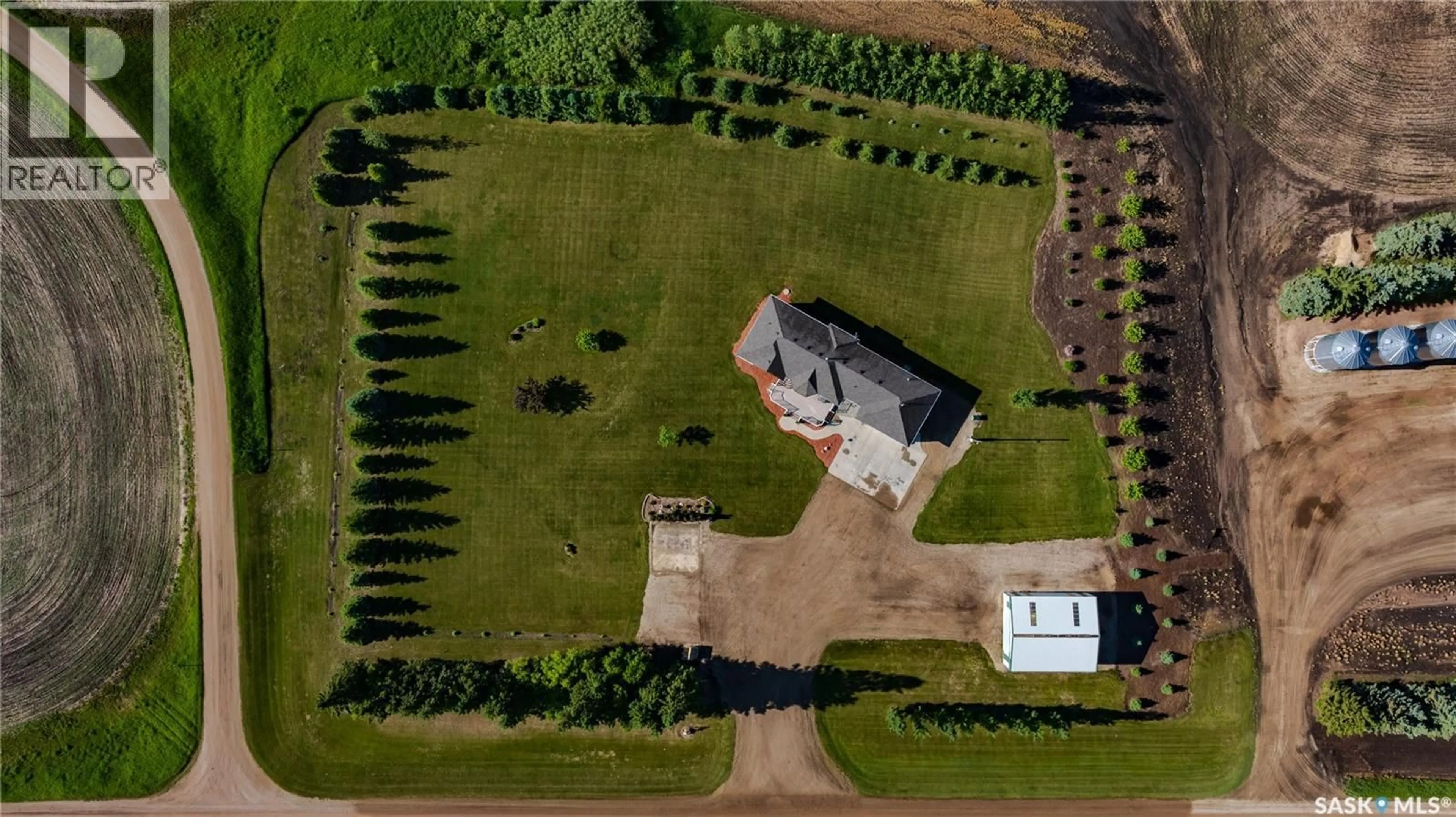 A pic from outside/outdoor area/front of a property/back of a property/a pic from drone, building for HIEBERT ACREAGE, Willow Creek Rm No. 458 Saskatchewan S0E1A0
