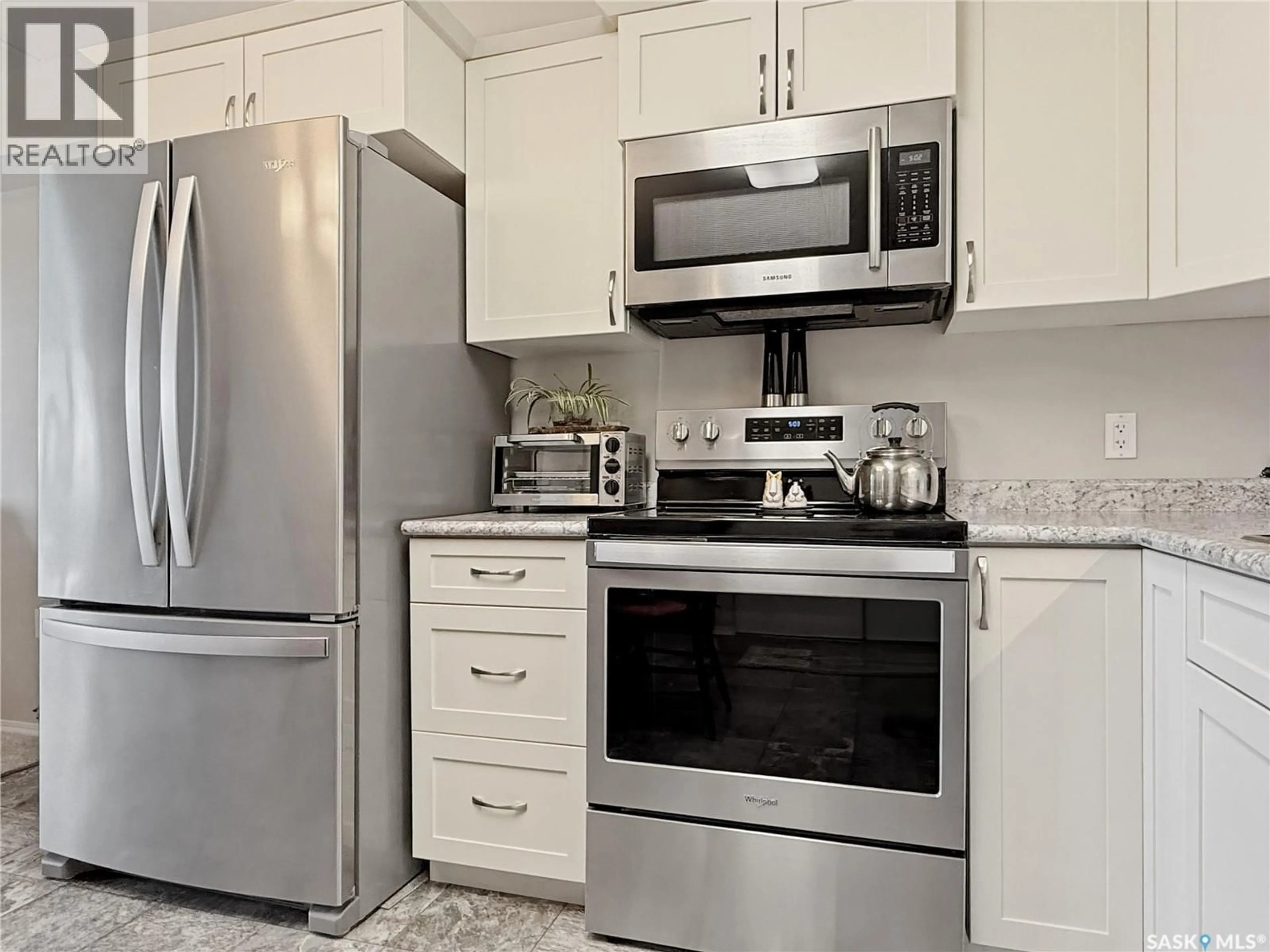 Standard kitchen, ceramic/tile floor for 201 2426 BUHLER AVENUE, North Battleford Saskatchewan S9A1R5