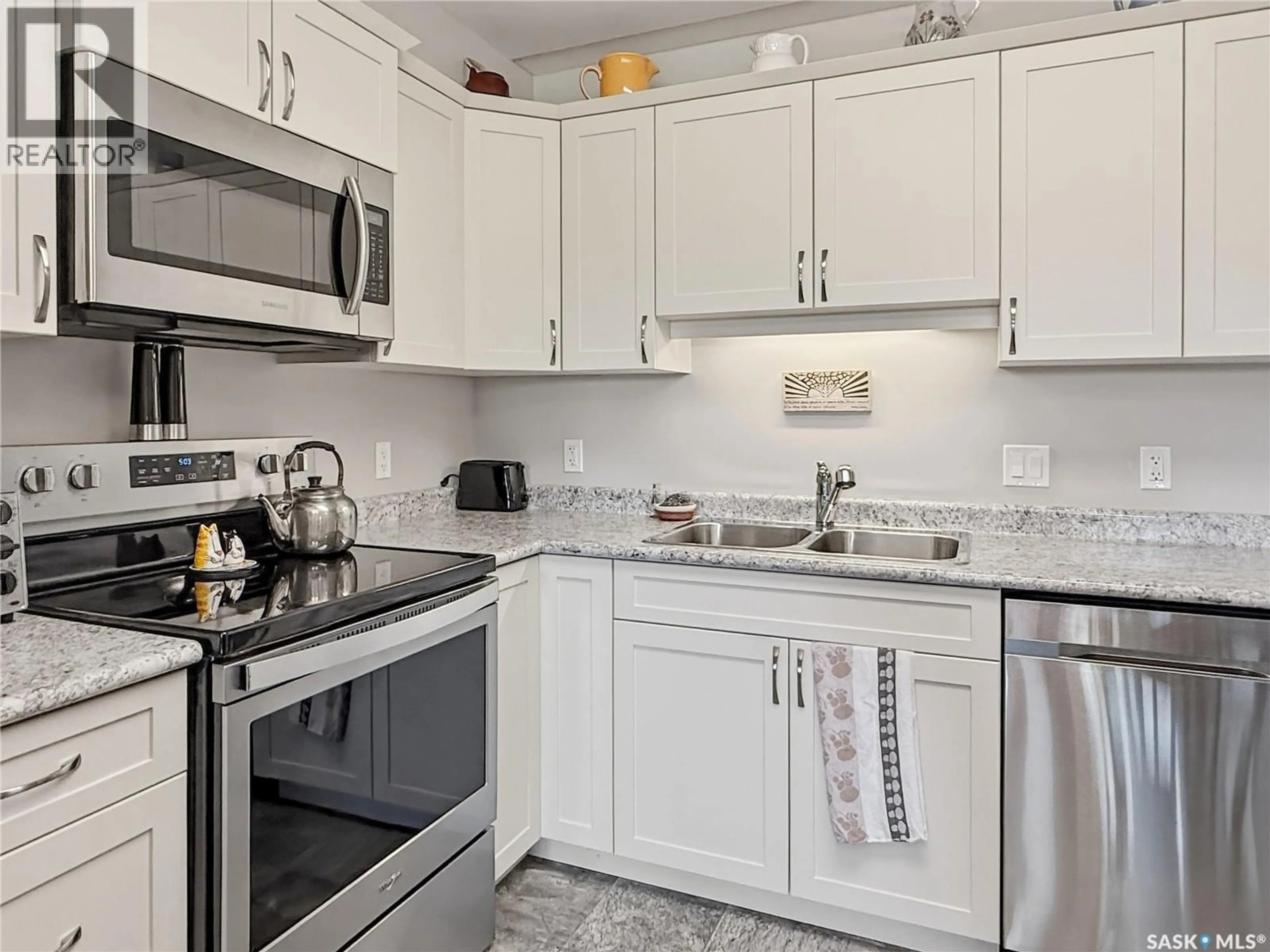 Standard kitchen, unknown for 201 2426 BUHLER AVENUE, North Battleford Saskatchewan S9A1R5