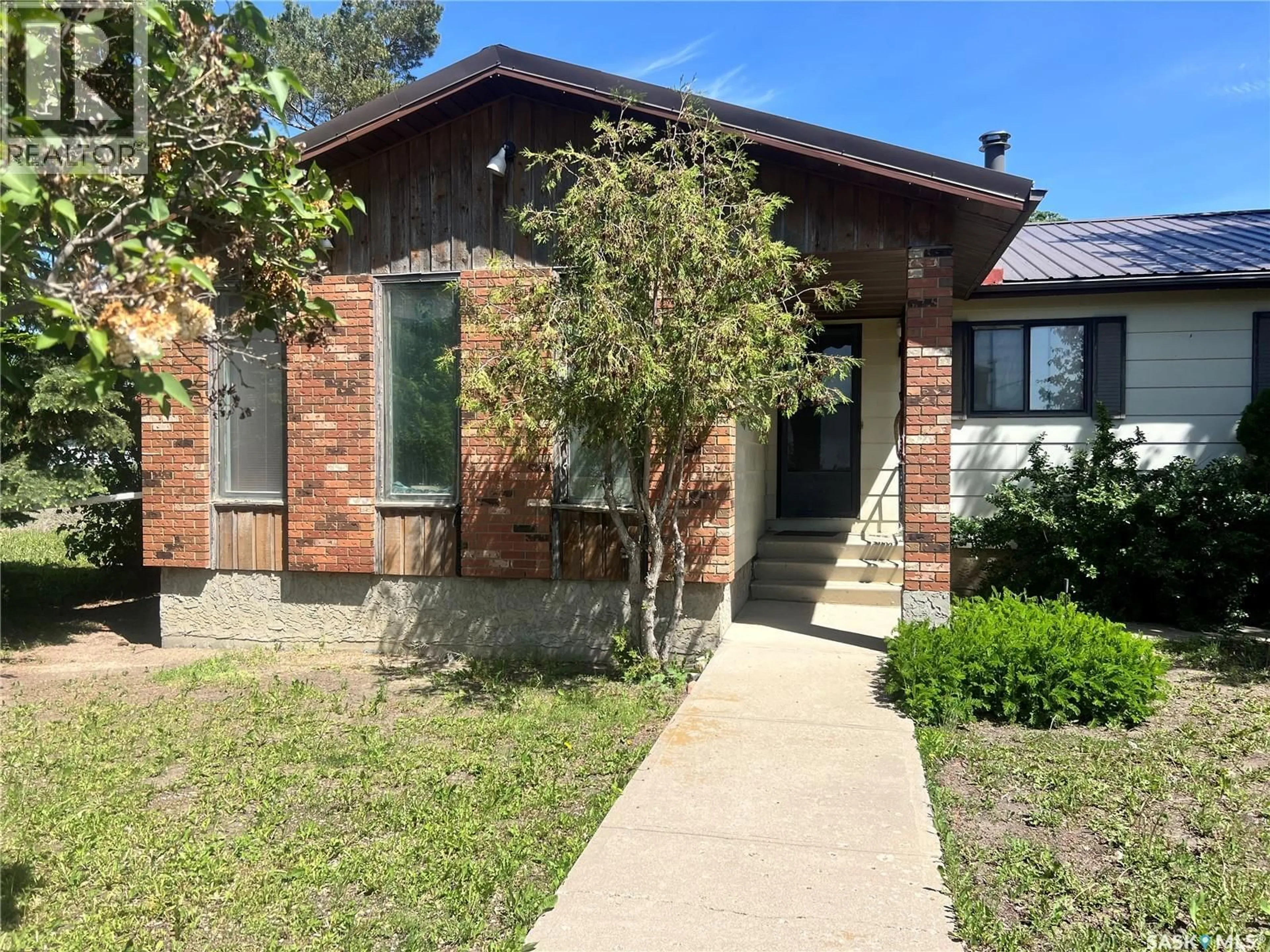 Home with brick exterior material, street for 561 FORD STREET, Bethune Saskatchewan S0G0H0
