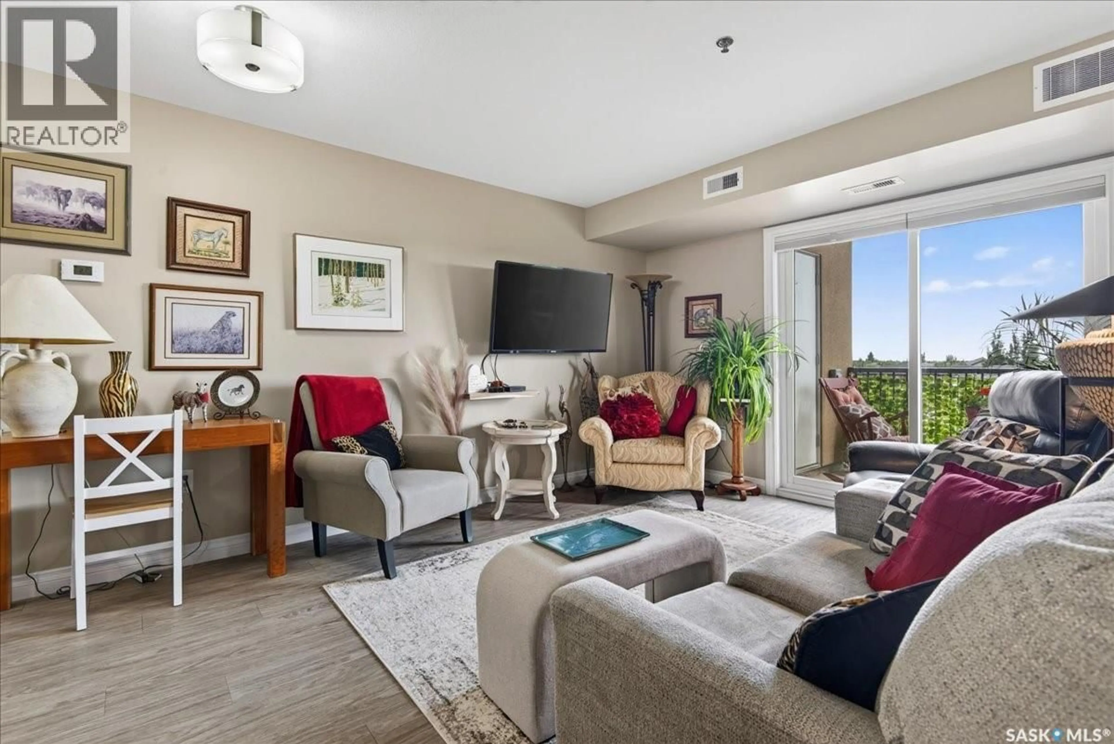 Living room with furniture, unknown for 306 - 3630 HAUGHTON ROAD, Regina Saskatchewan S4V1P1