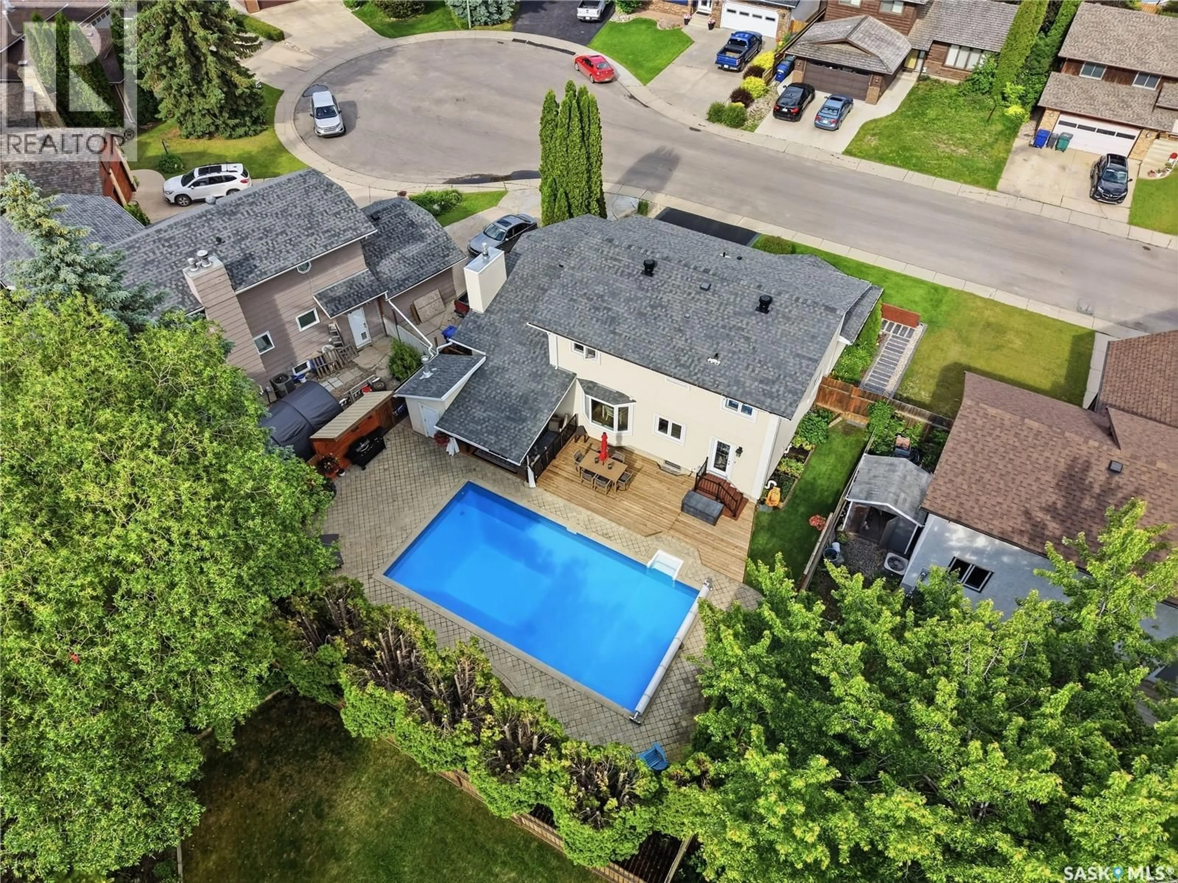 A pic from outside/outdoor area/front of a property/back of a property/a pic from drone, street for 306 NOKOMIS PLACE, Saskatoon Saskatchewan S7K5E2