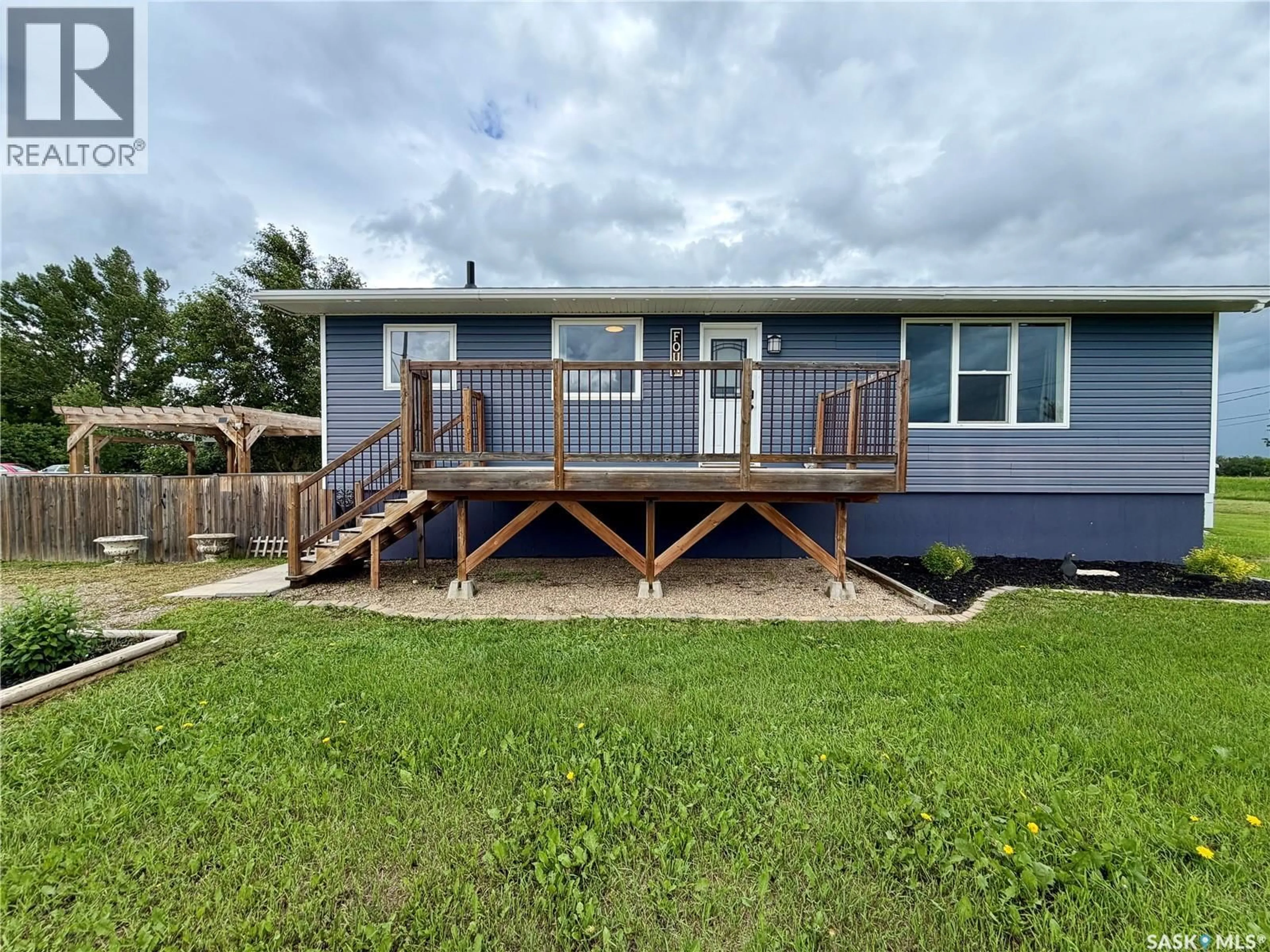 A pic from outside/outdoor area/front of a property/back of a property/a pic from drone, water/lake/river/ocean view for 4 SASKATCHEWAN AVENUE, Tuxford Saskatchewan S0H4C0
