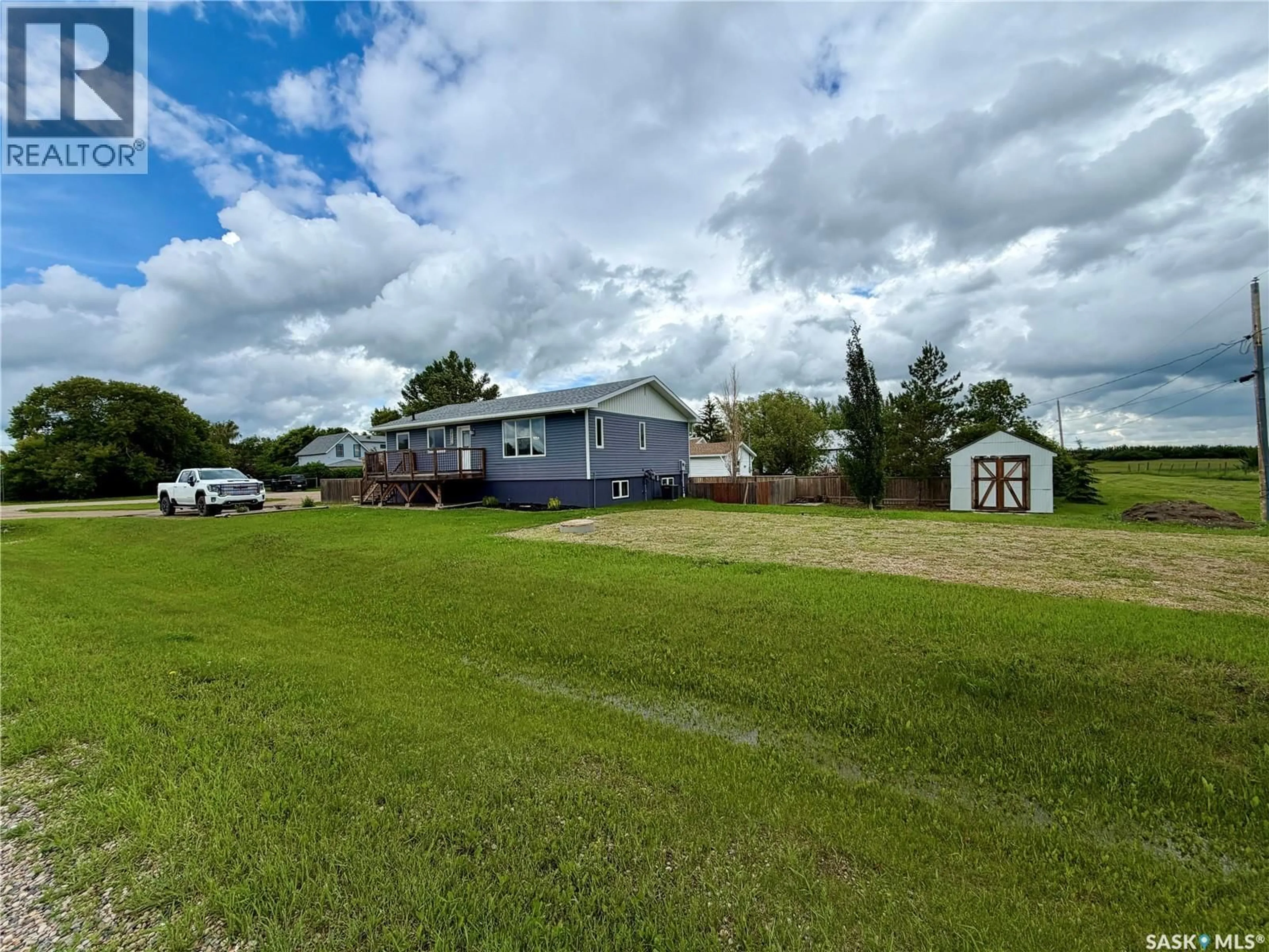 A pic from outside/outdoor area/front of a property/back of a property/a pic from drone, water/lake/river/ocean view for 4 SASKATCHEWAN AVENUE, Tuxford Saskatchewan S0H4C0
