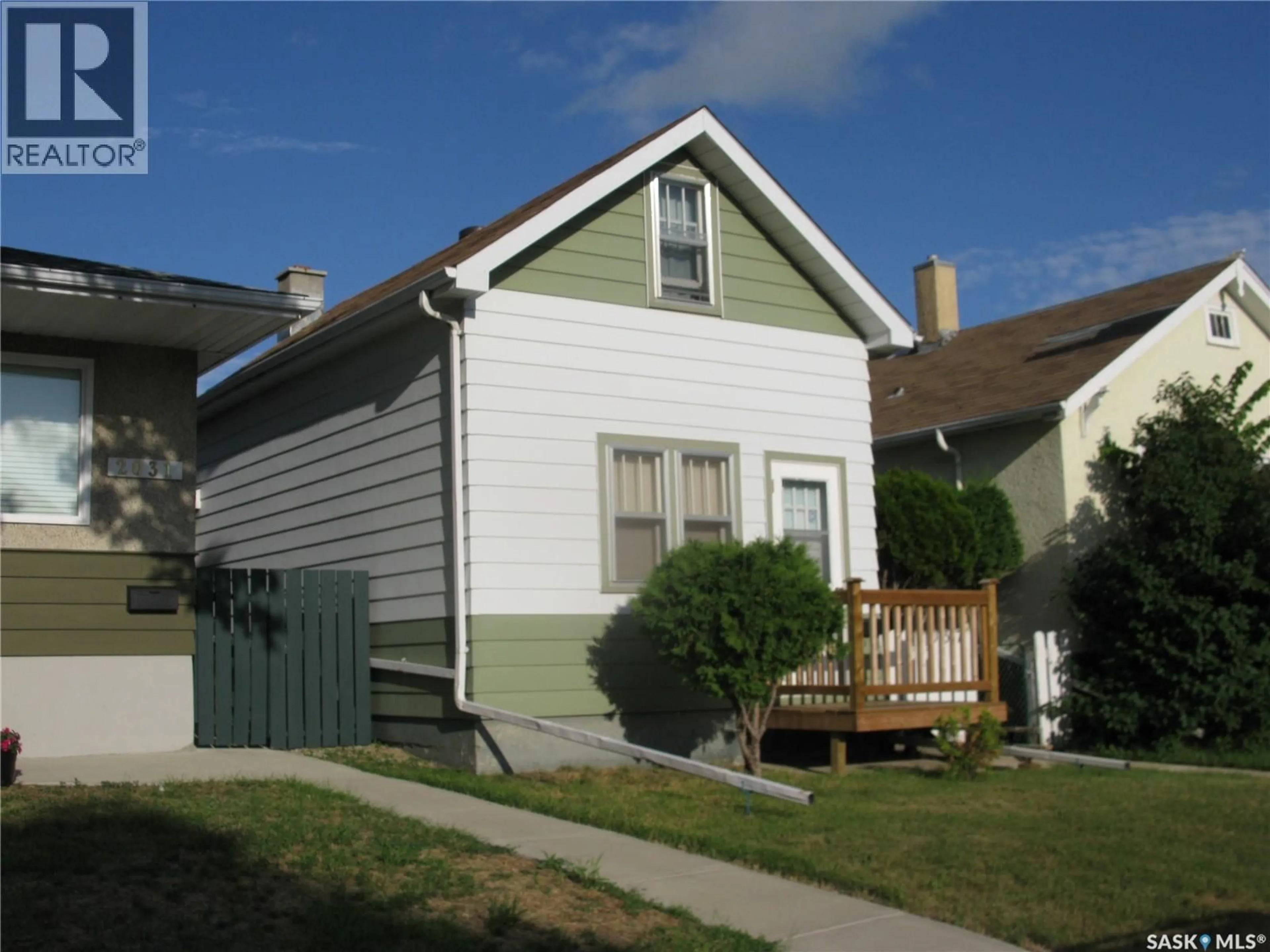 Home with vinyl exterior material, street for 2037 REYNOLDS STREET, Regina Saskatchewan S4N3M9