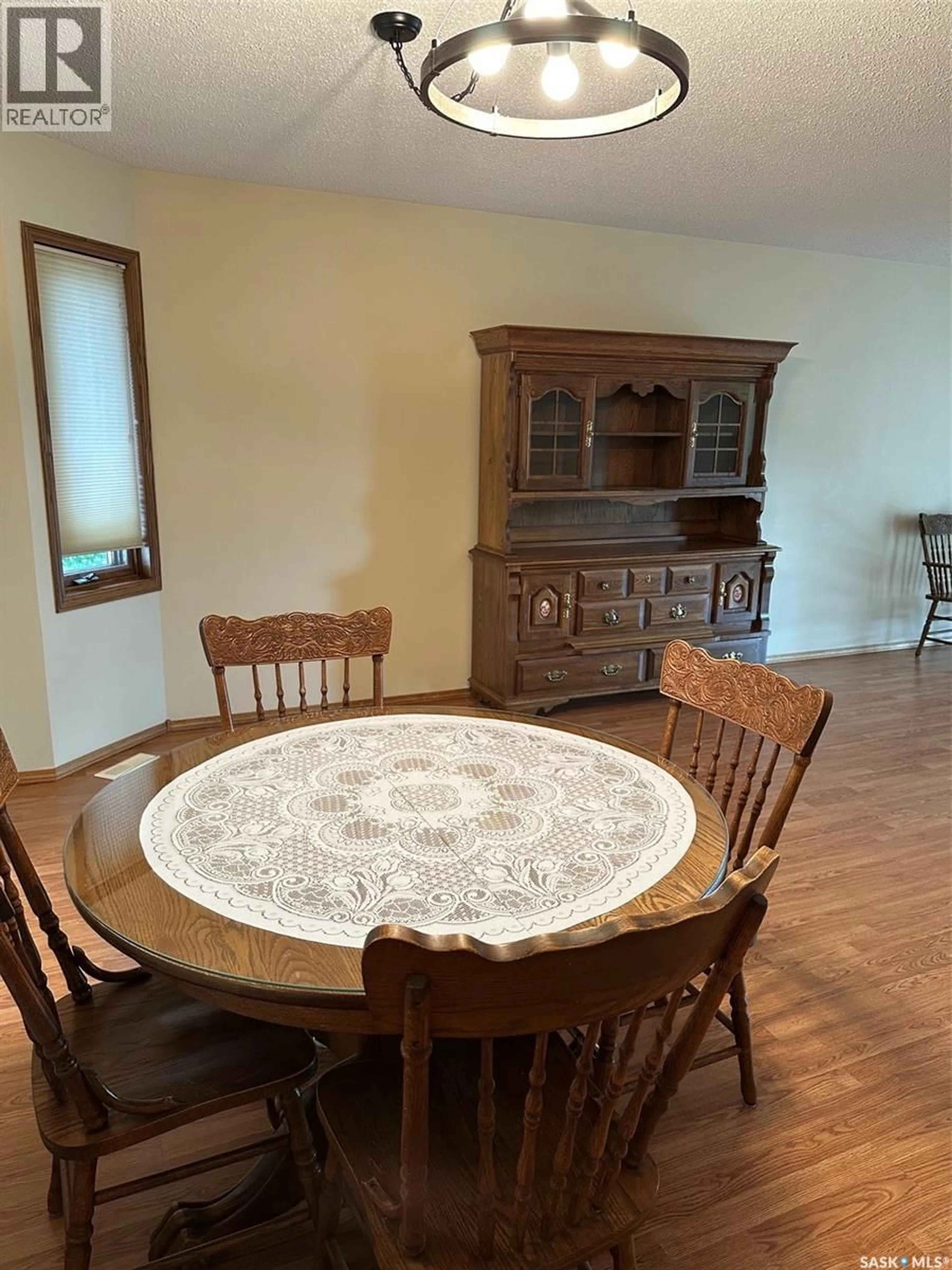 Dining room, wood/laminate floor for 303 1214 3RD STREET, Estevan Saskatchewan S4A0R9