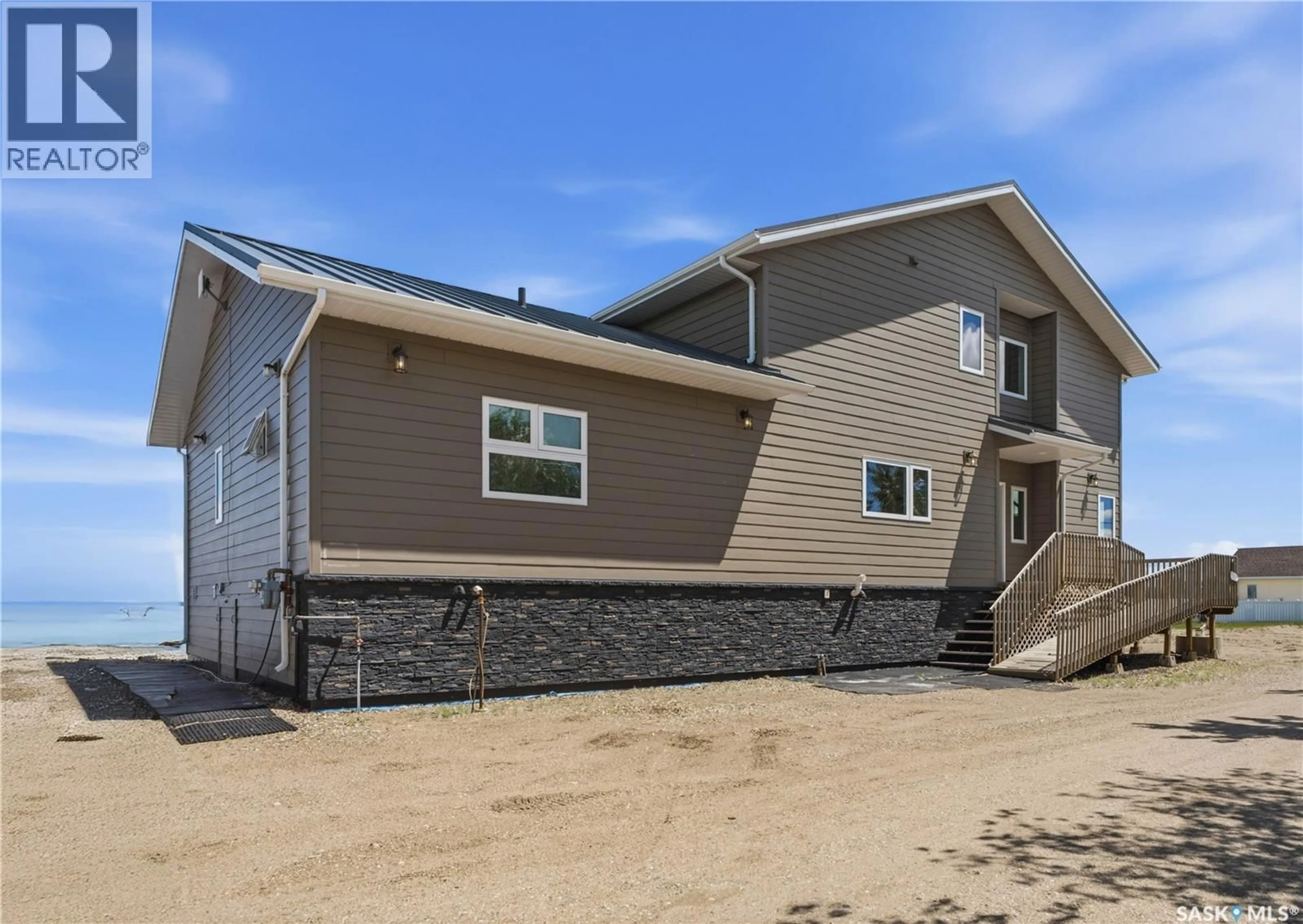 Home with vinyl exterior material, building for 106 LAKESHORE LANE, Leslie Beach Saskatchewan S0A1A0