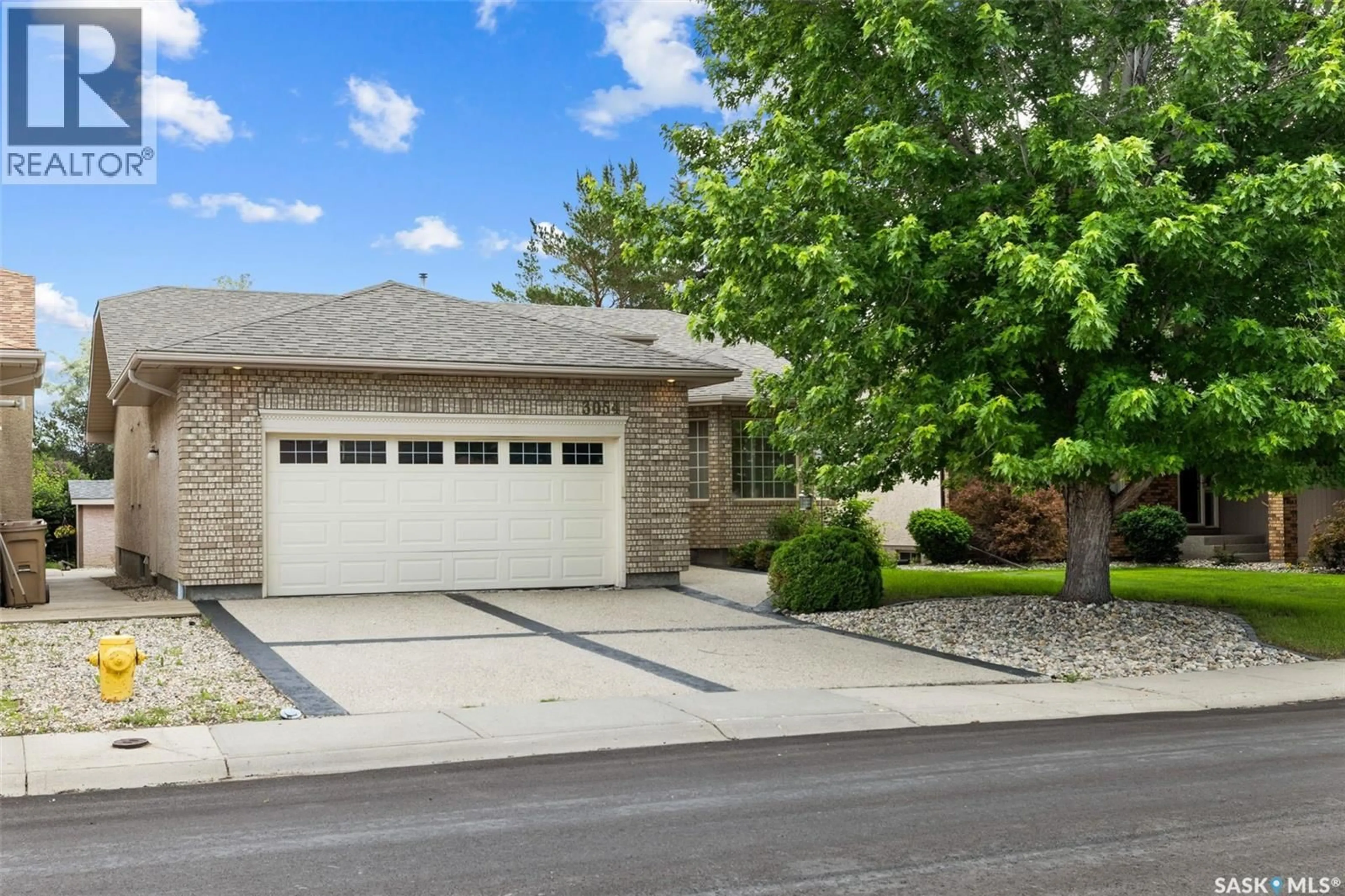 Home with vinyl exterior material, street for 3054 WASCANA GLEN, Regina Saskatchewan S4V2L3