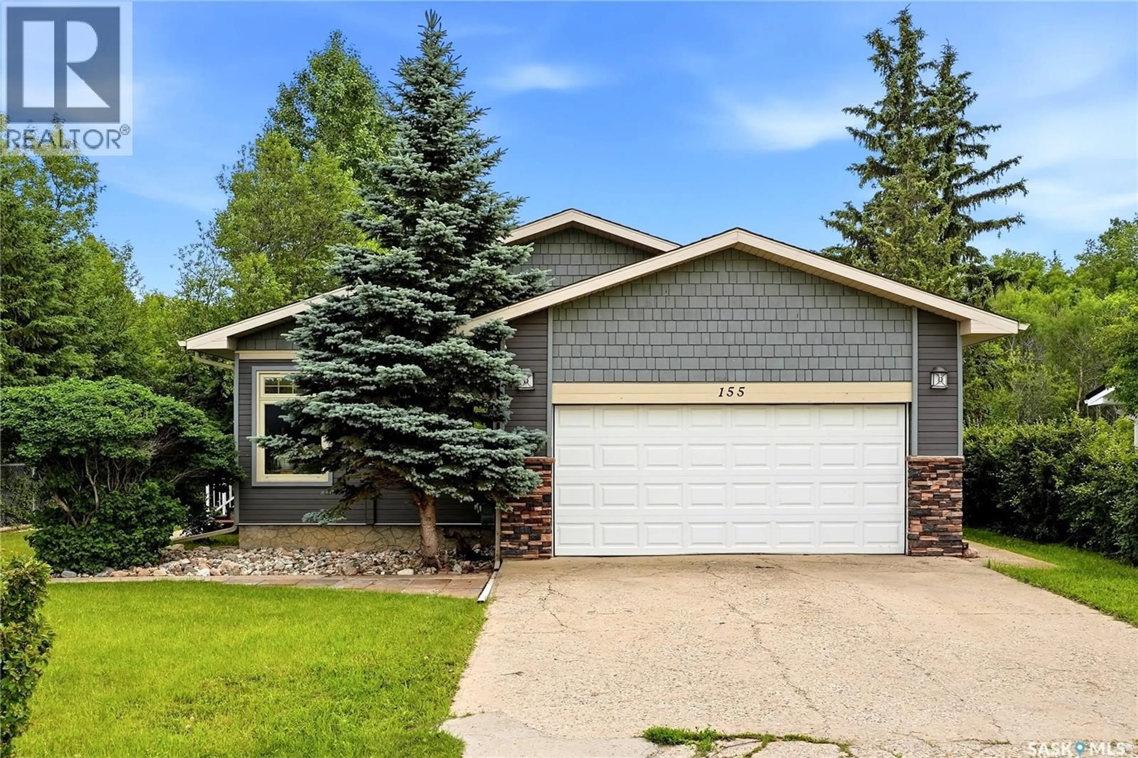 Home with vinyl exterior material, street for 155 QU'APPELLE DRIVE, Lumsden Saskatchewan S0G3C0