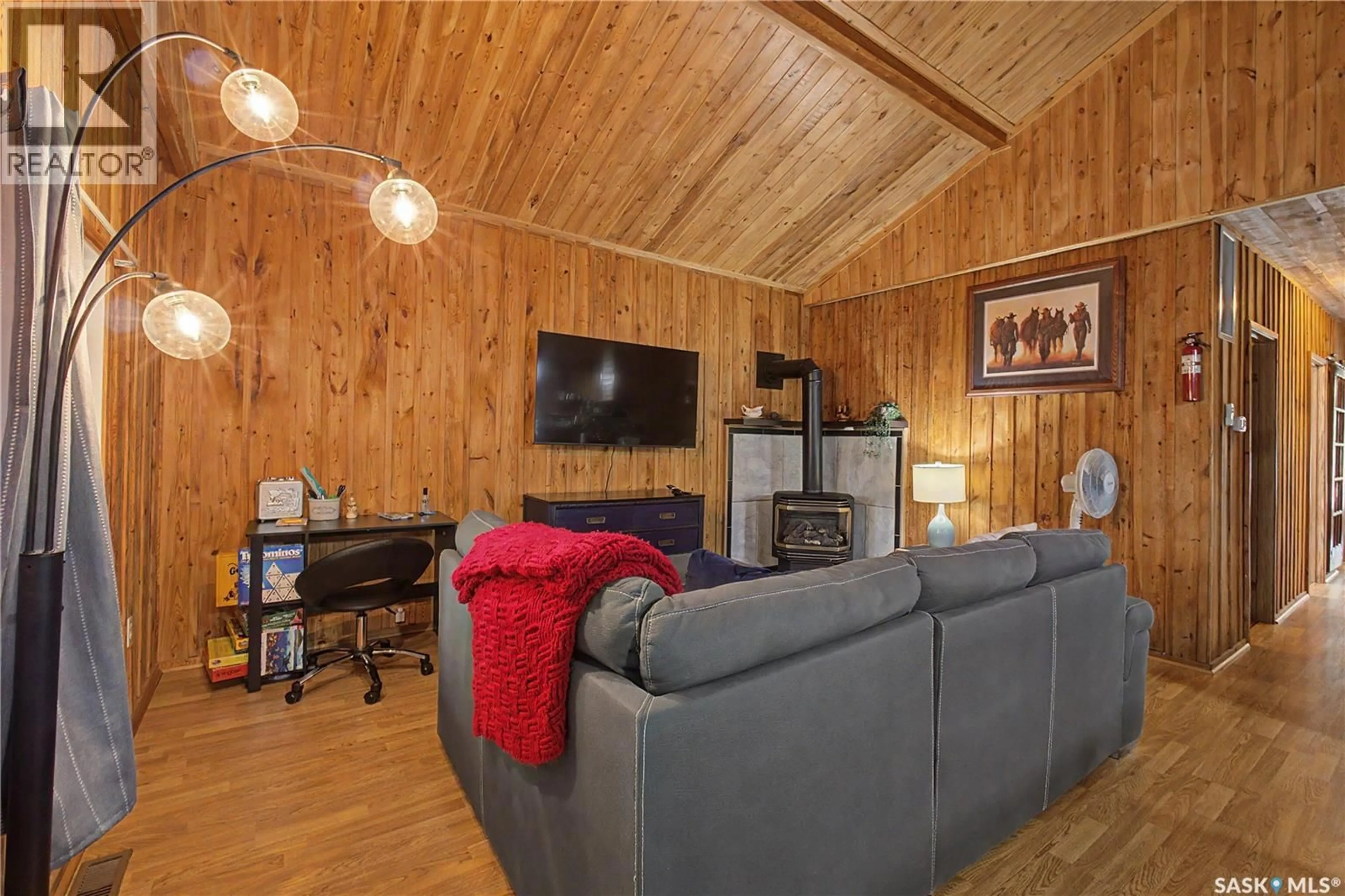 Living room with furniture, wood/laminate floor for 305 WAPITI ROAD, Nipawin Rm No. 487 Saskatchewan S0E0M0
