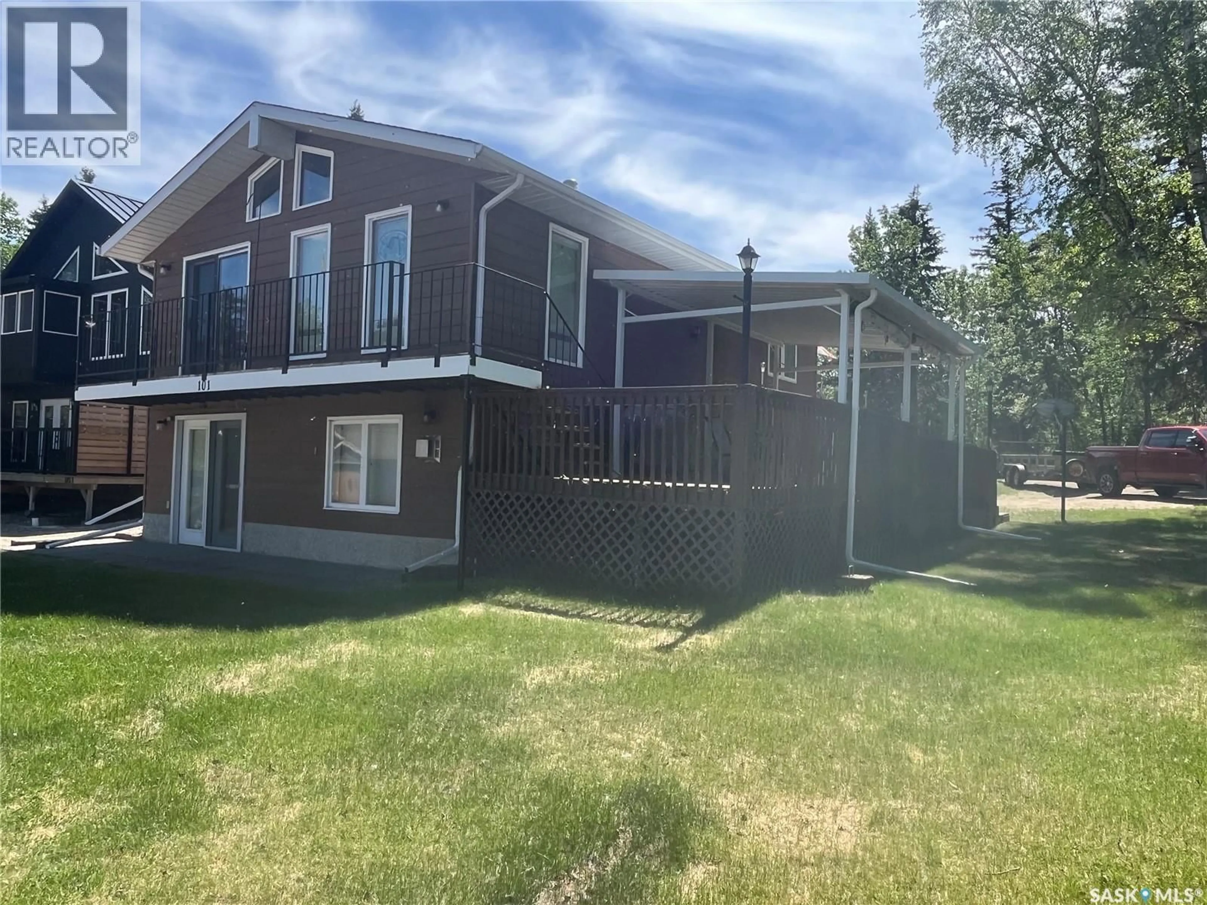 A pic from outside/outdoor area/front of a property/back of a property/a pic from drone, water/lake/river/ocean view for 101 HAGEN PLACE, Emma Lake Saskatchewan S0J0N0