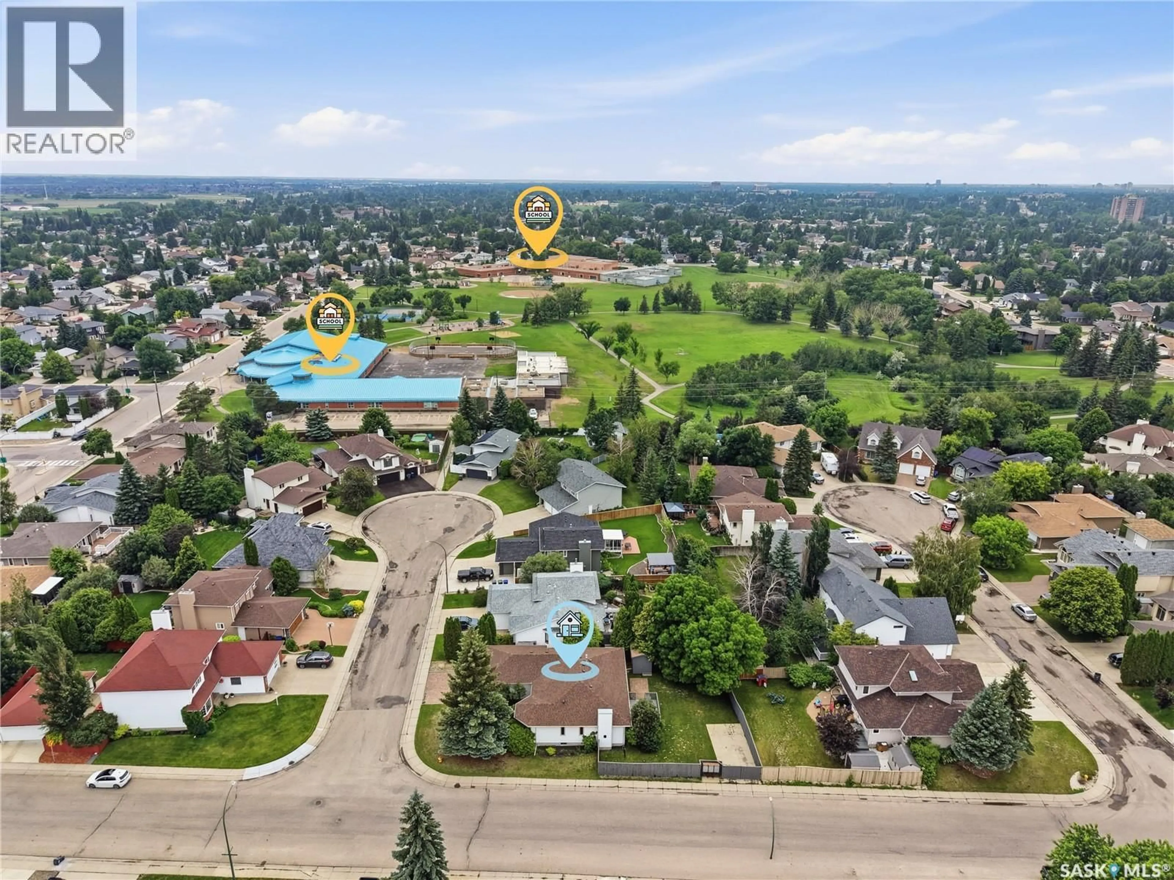 A pic from outside/outdoor area/front of a property/back of a property/a pic from drone, mountain view for 539 EMMELINE KEY, Saskatoon Saskatchewan S7J5G8