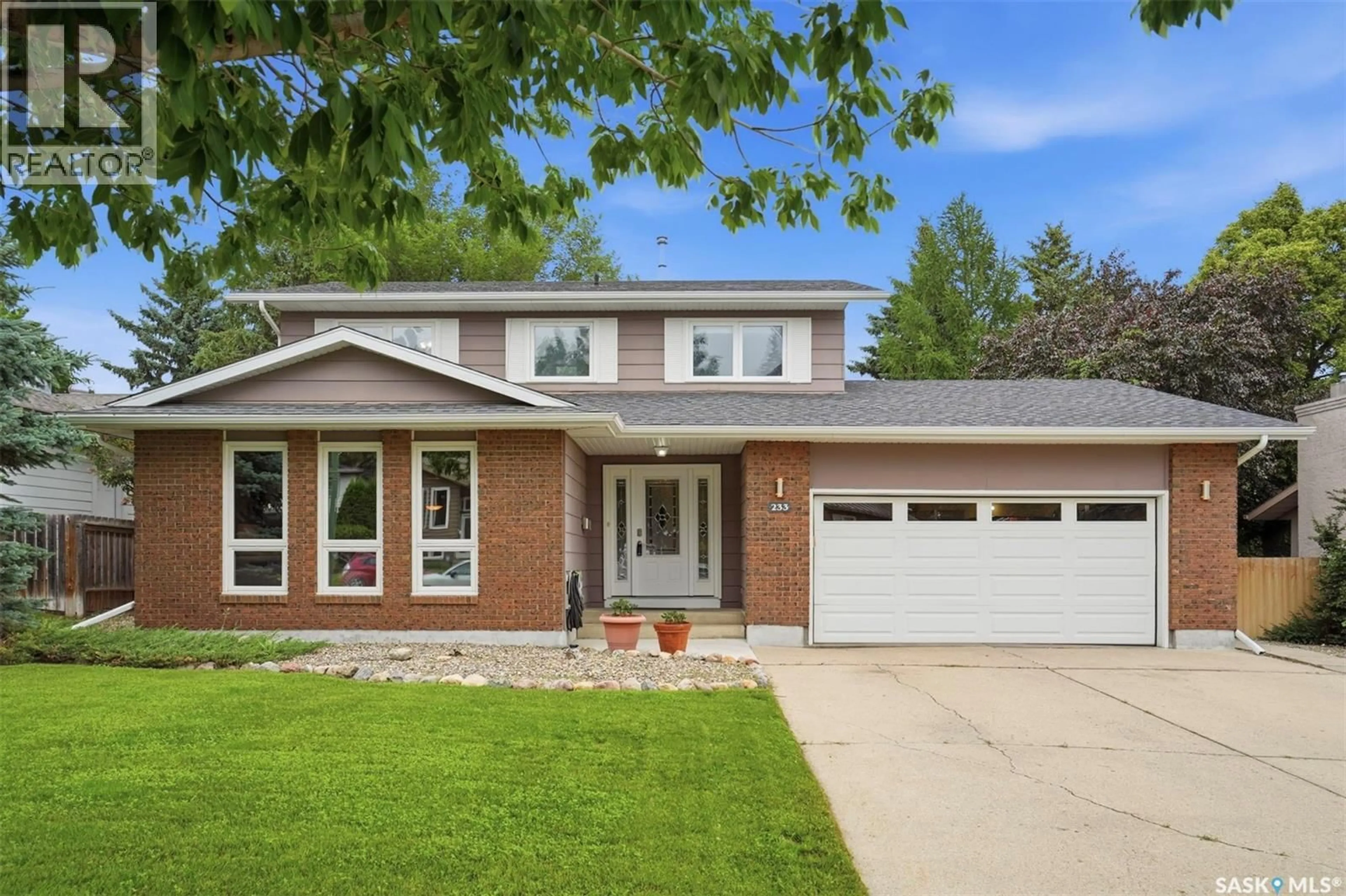 Home with brick exterior material, street for 233 STURGEON PLACE, Saskatoon Saskatchewan S7K4C5