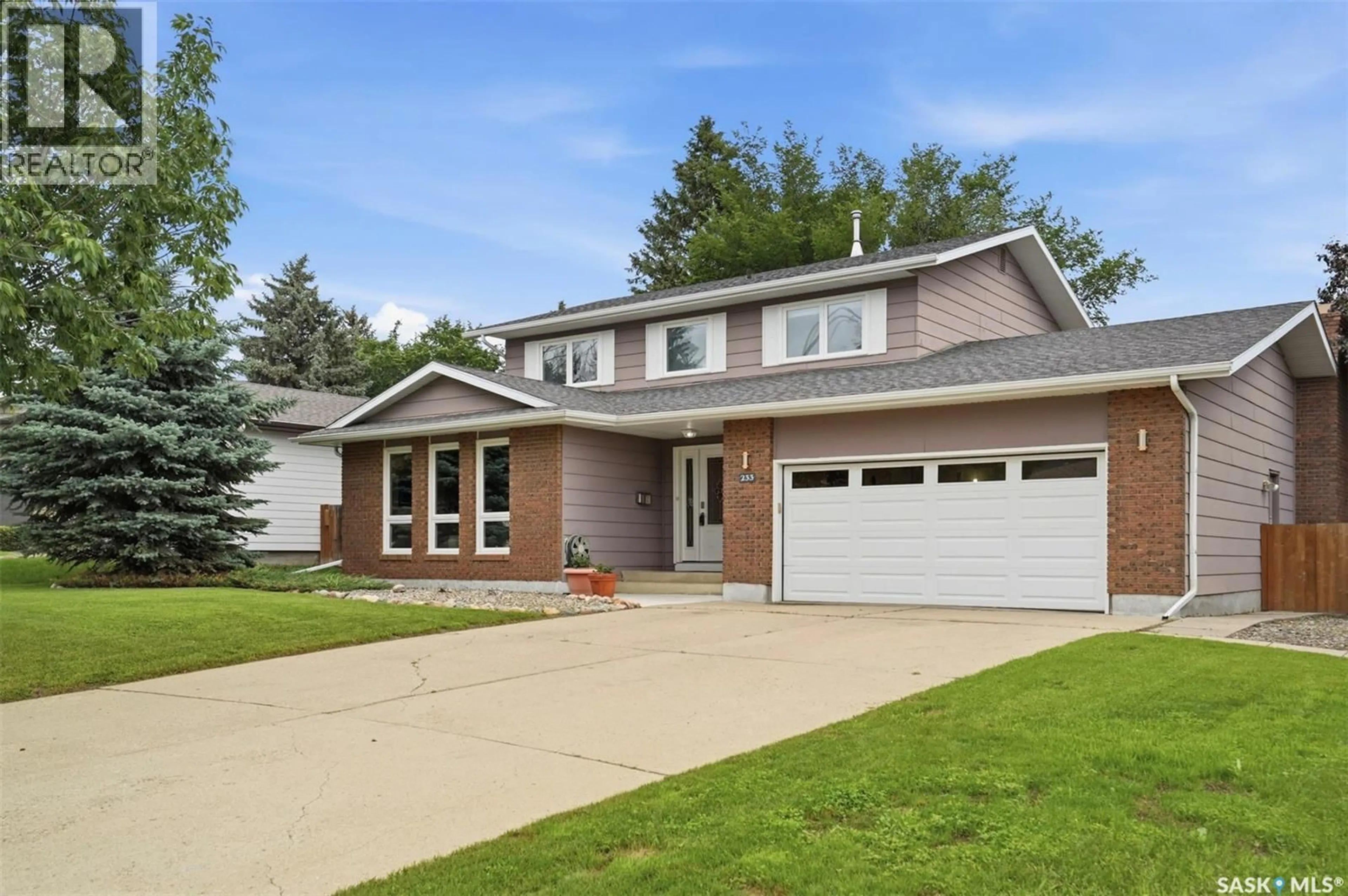 Home with brick exterior material, street for 233 STURGEON PLACE, Saskatoon Saskatchewan S7K4C5