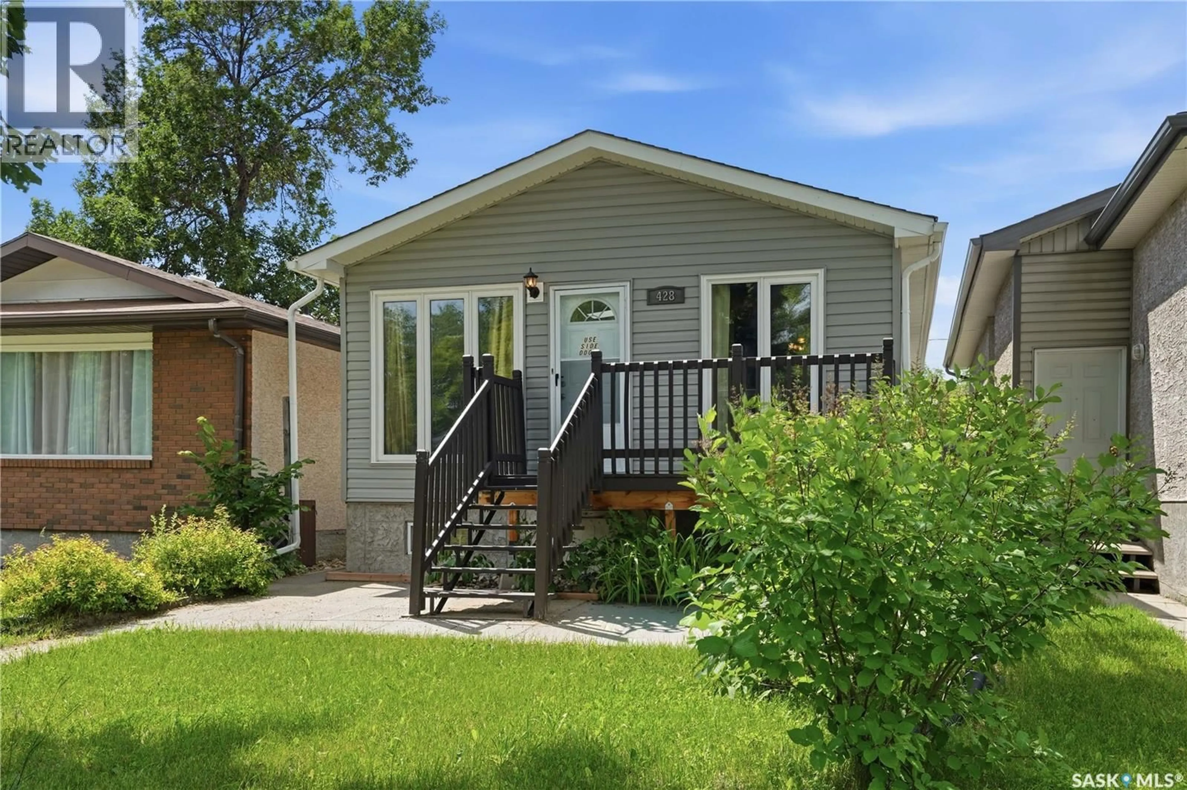 Home with vinyl exterior material, street for 428 ST JOHN STREET, Regina Saskatchewan S4R1R3