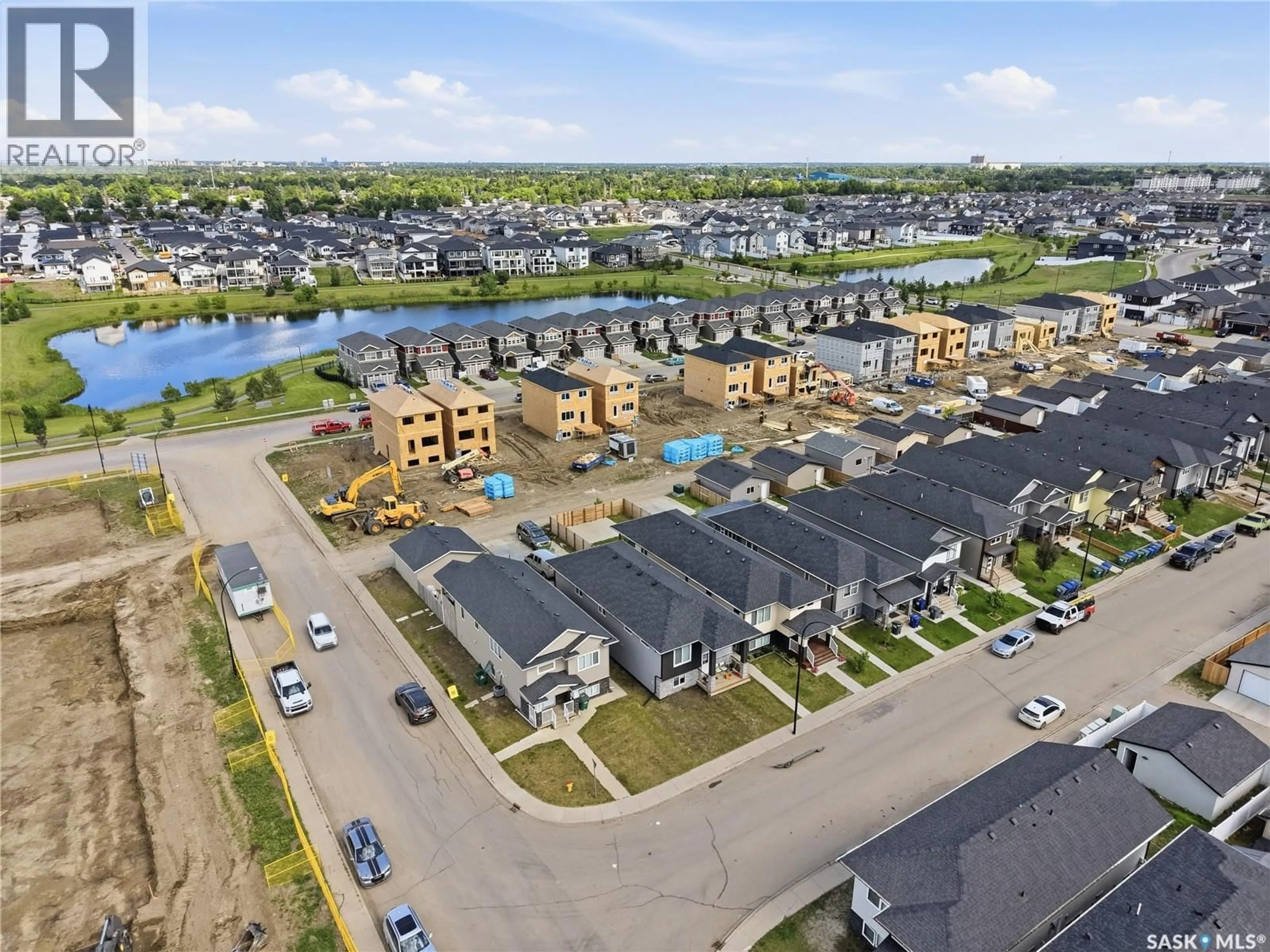 A pic from outside/outdoor area/front of a property/back of a property/a pic from drone, water/lake/river/ocean view for 706 ELLS LANE, Saskatoon Saskatchewan S7L6H9