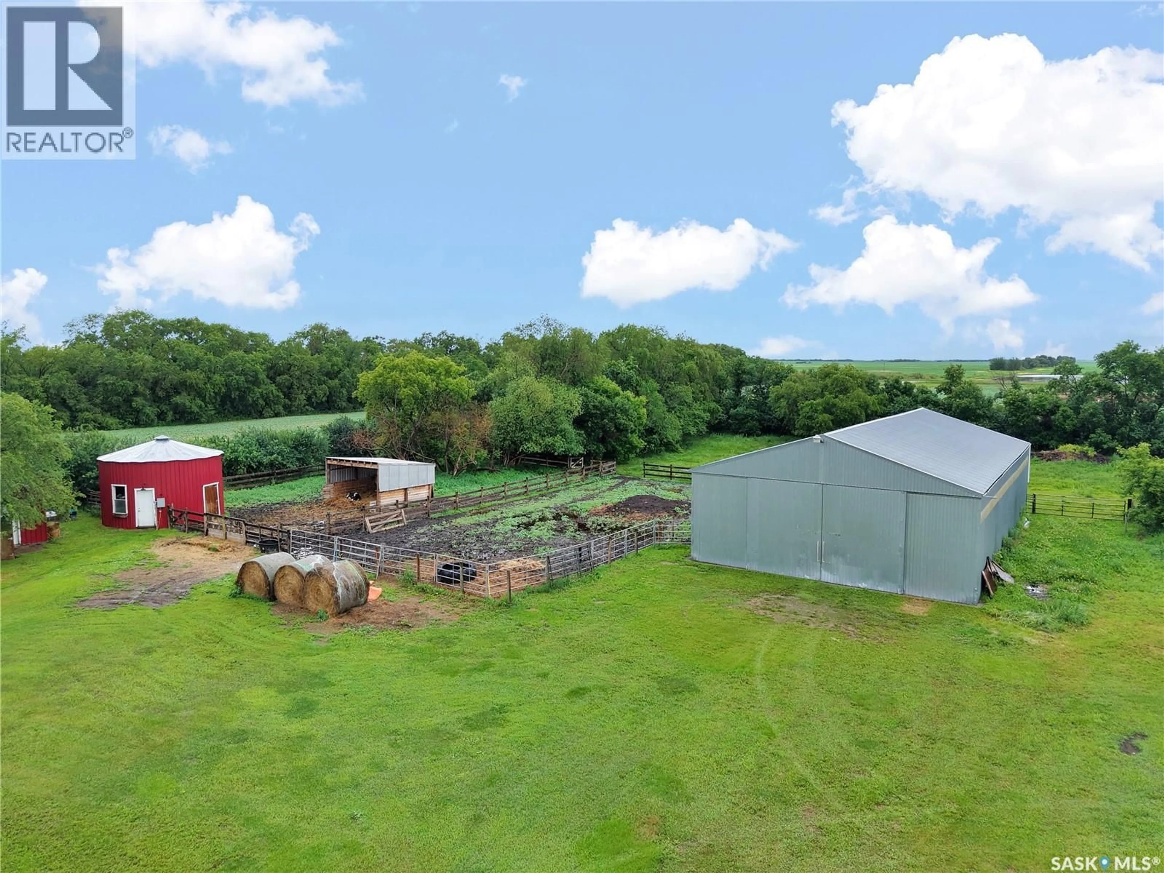 A pic from outside/outdoor area/front of a property/back of a property/a pic from drone, building for BUECKERT ACREAGE, Rosthern Rm No. 403 Saskatchewan S0K4R0