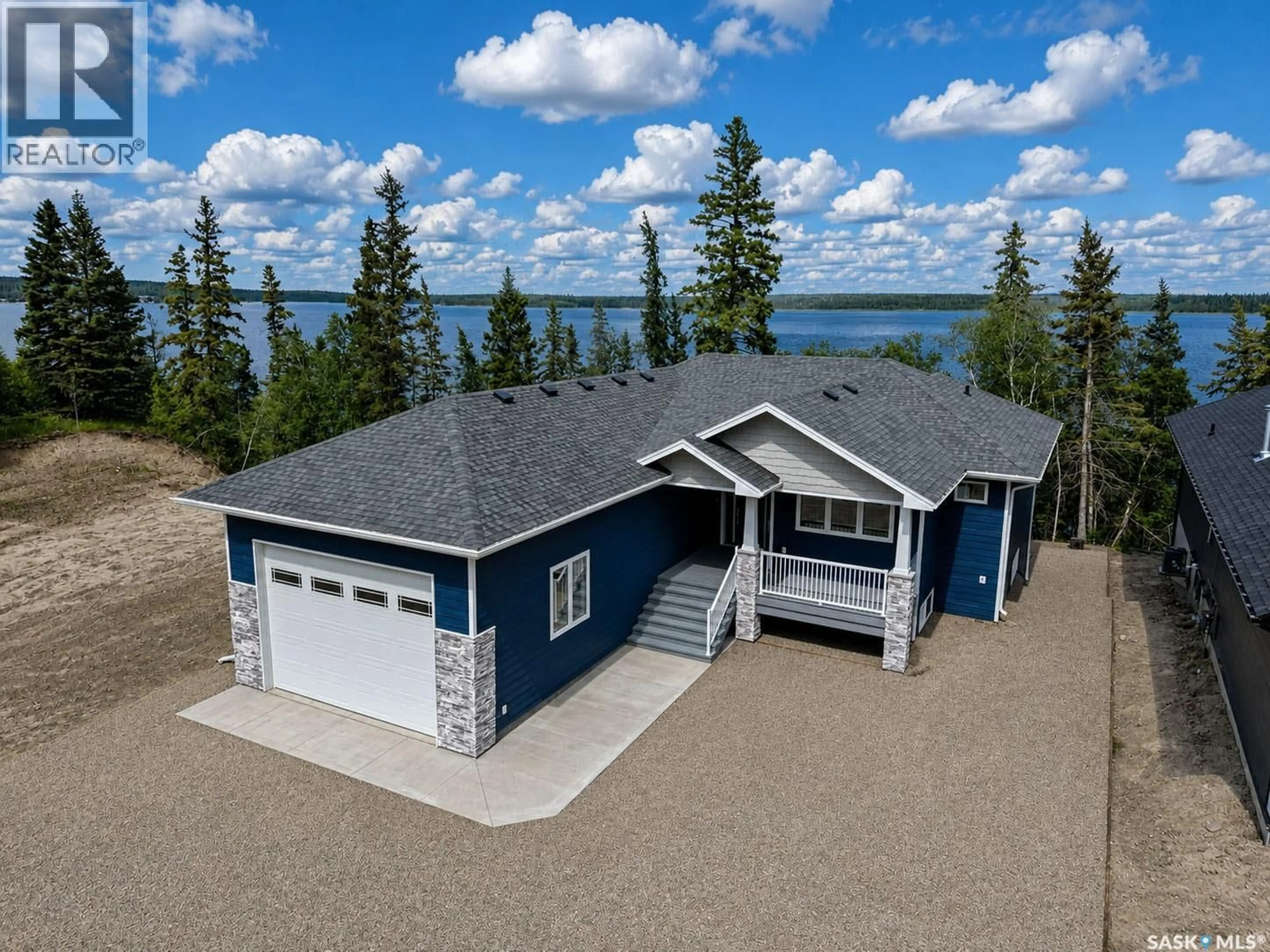 A pic from outside/outdoor area/front of a property/back of a property/a pic from drone, water/lake/river/ocean view for 153 WARD DRIVE, Lakeland Rm No. 521 Saskatchewan S0J0N0