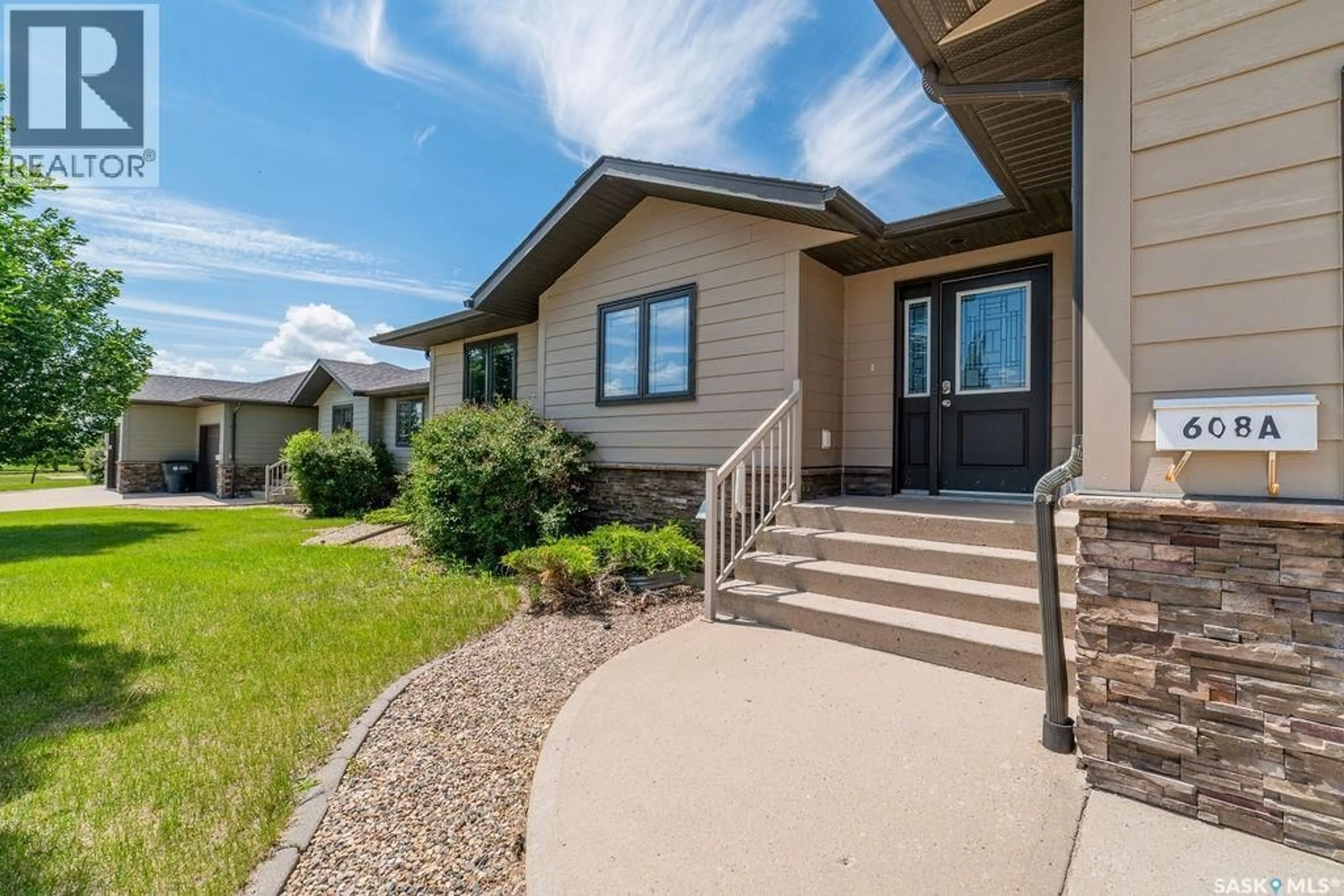 Home with vinyl exterior material, street for 636 RICHE STREET, Bethune Saskatchewan S0G0H0