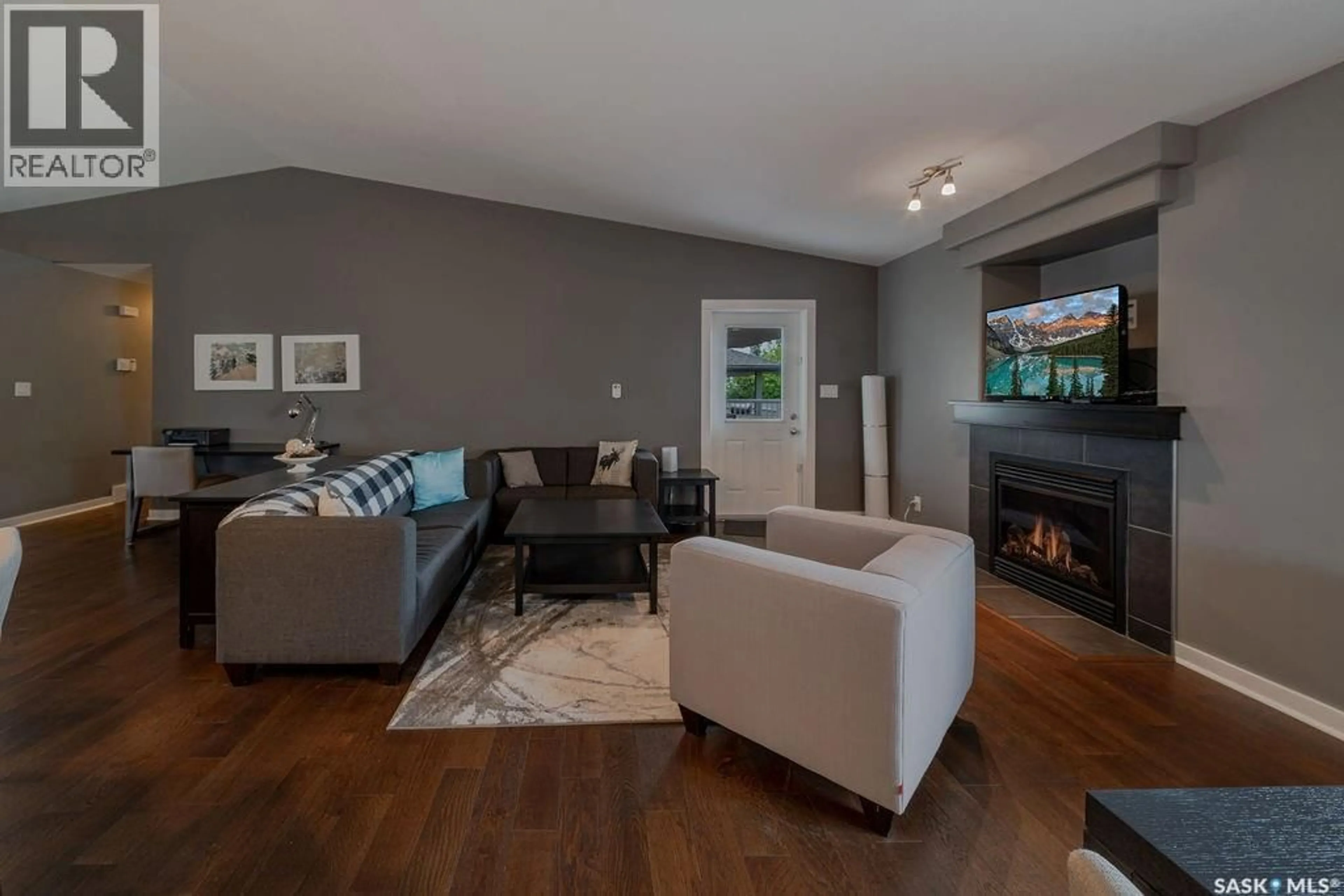 Living room with furniture, wood/laminate floor for 636 RICHE STREET, Bethune Saskatchewan S0G0H0