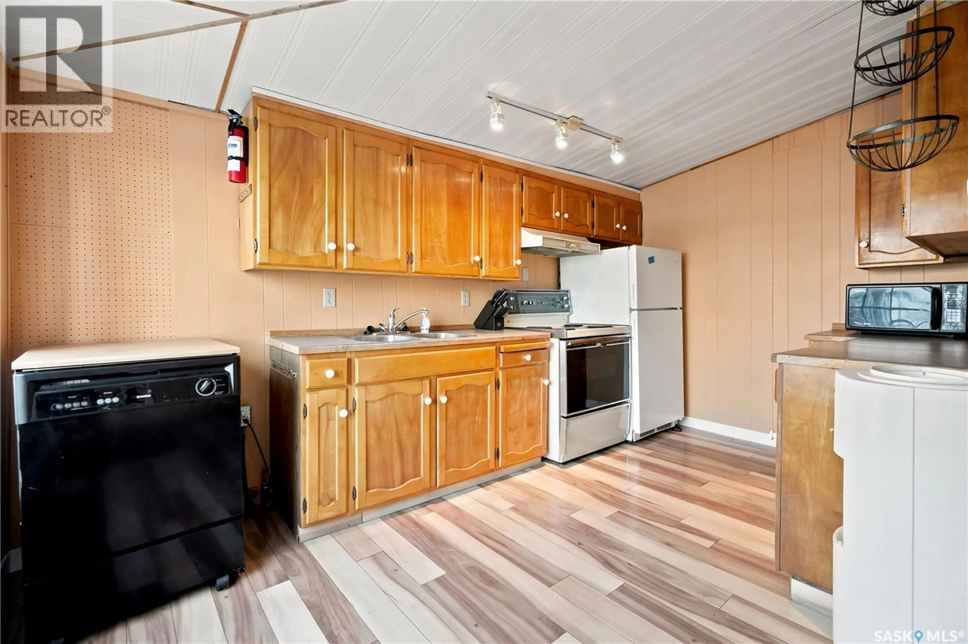 Standard kitchen, wood/laminate floor for 111 B-SAY-TAH ROAD, B-Say-Tah Saskatchewan S0G1S0