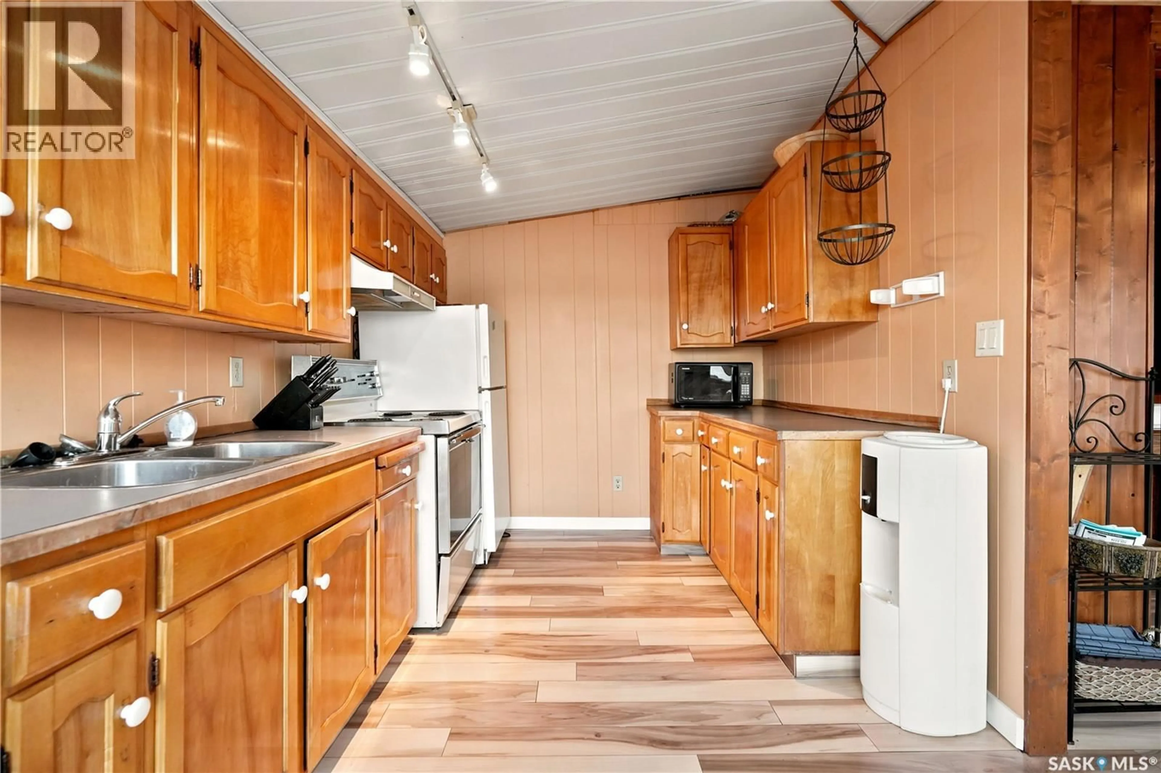 Standard kitchen, wood/laminate floor for 111 B-SAY-TAH ROAD, B-Say-Tah Saskatchewan S0G1S0