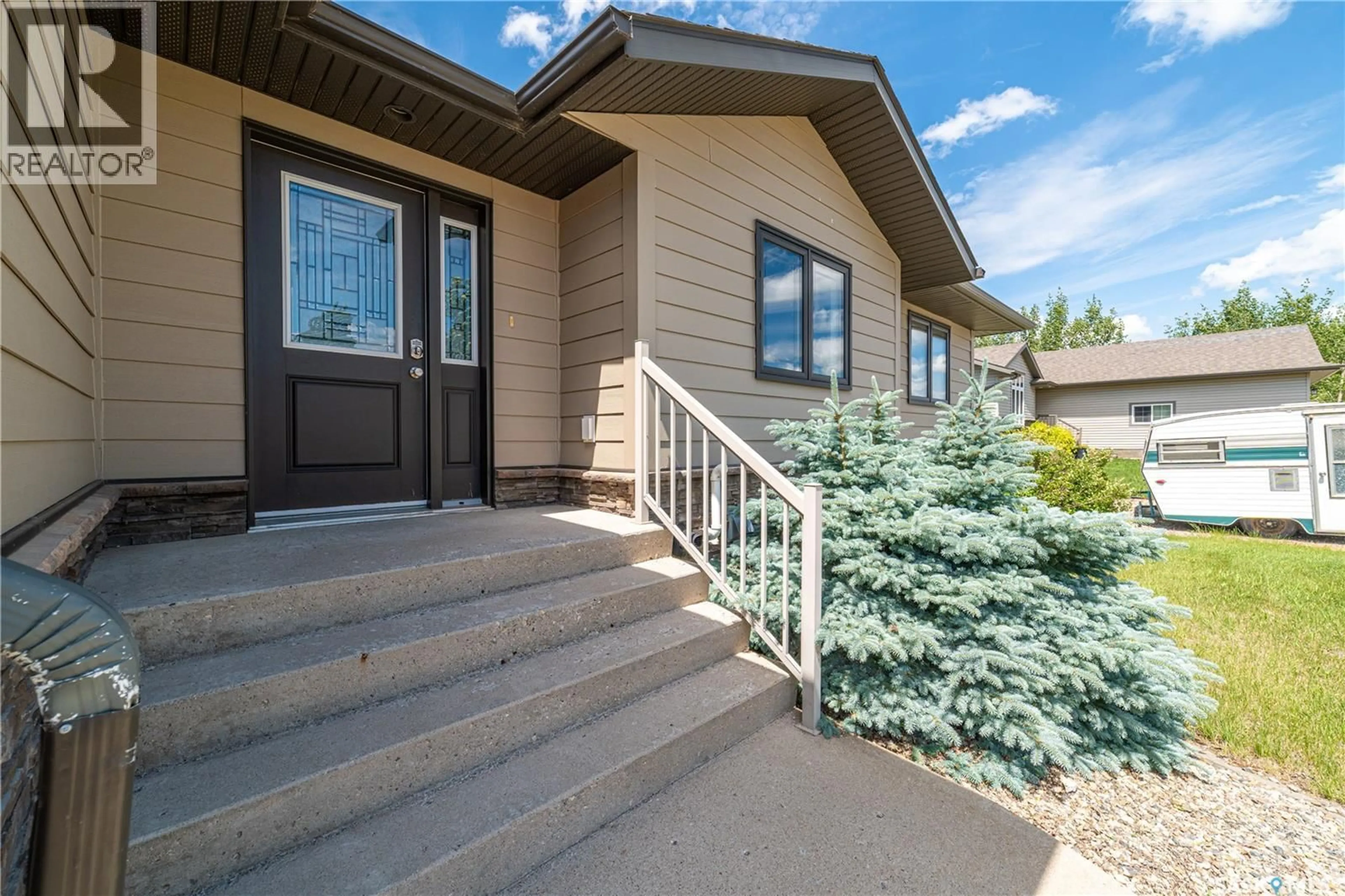 Home with vinyl exterior material, street for B - 608 RICHE STREET, Bethune Saskatchewan S0G0H0