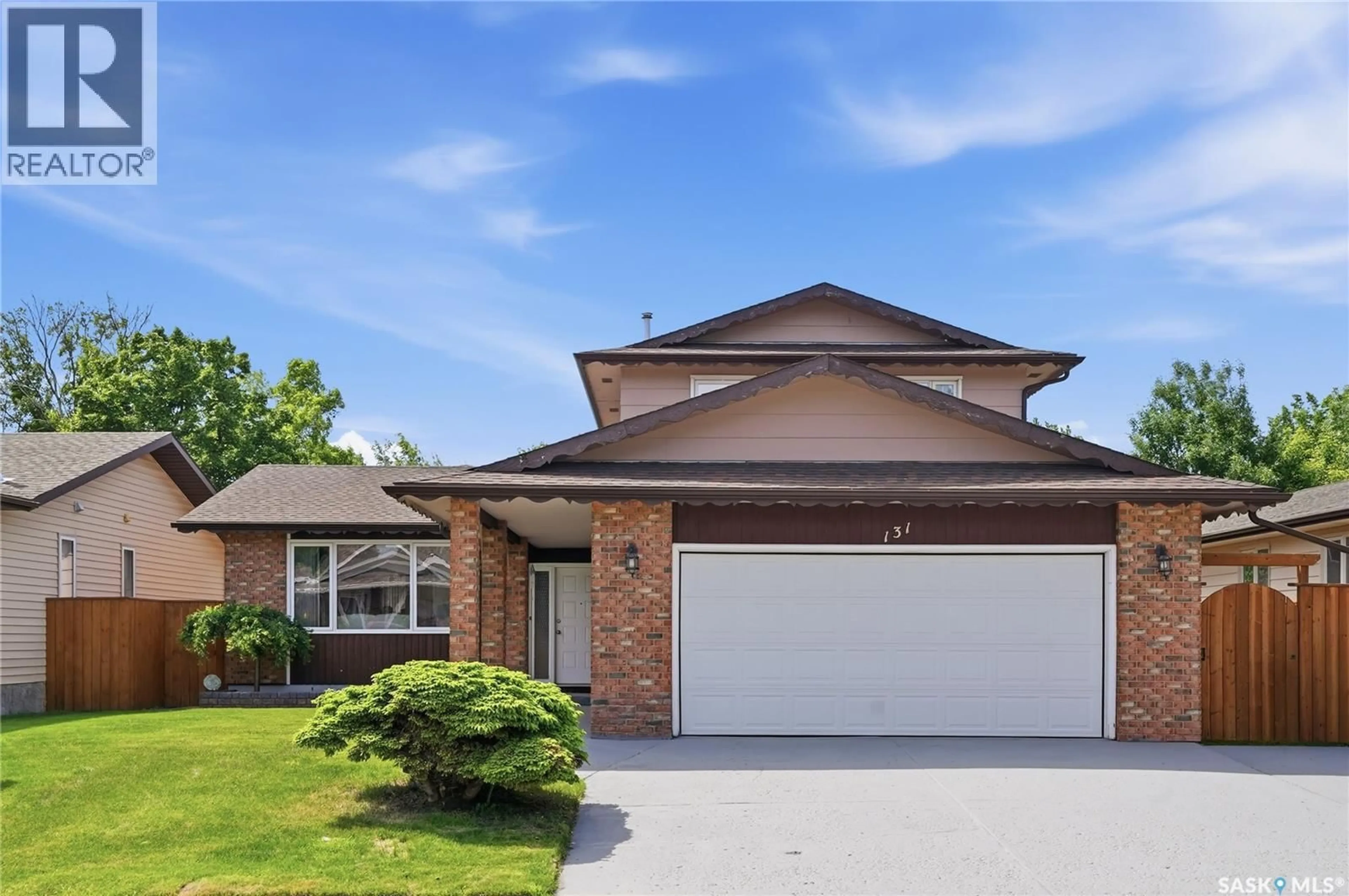 Home with brick exterior material, street for 131 KEELEY CRESCENT, Saskatoon Saskatchewan S7J4B3