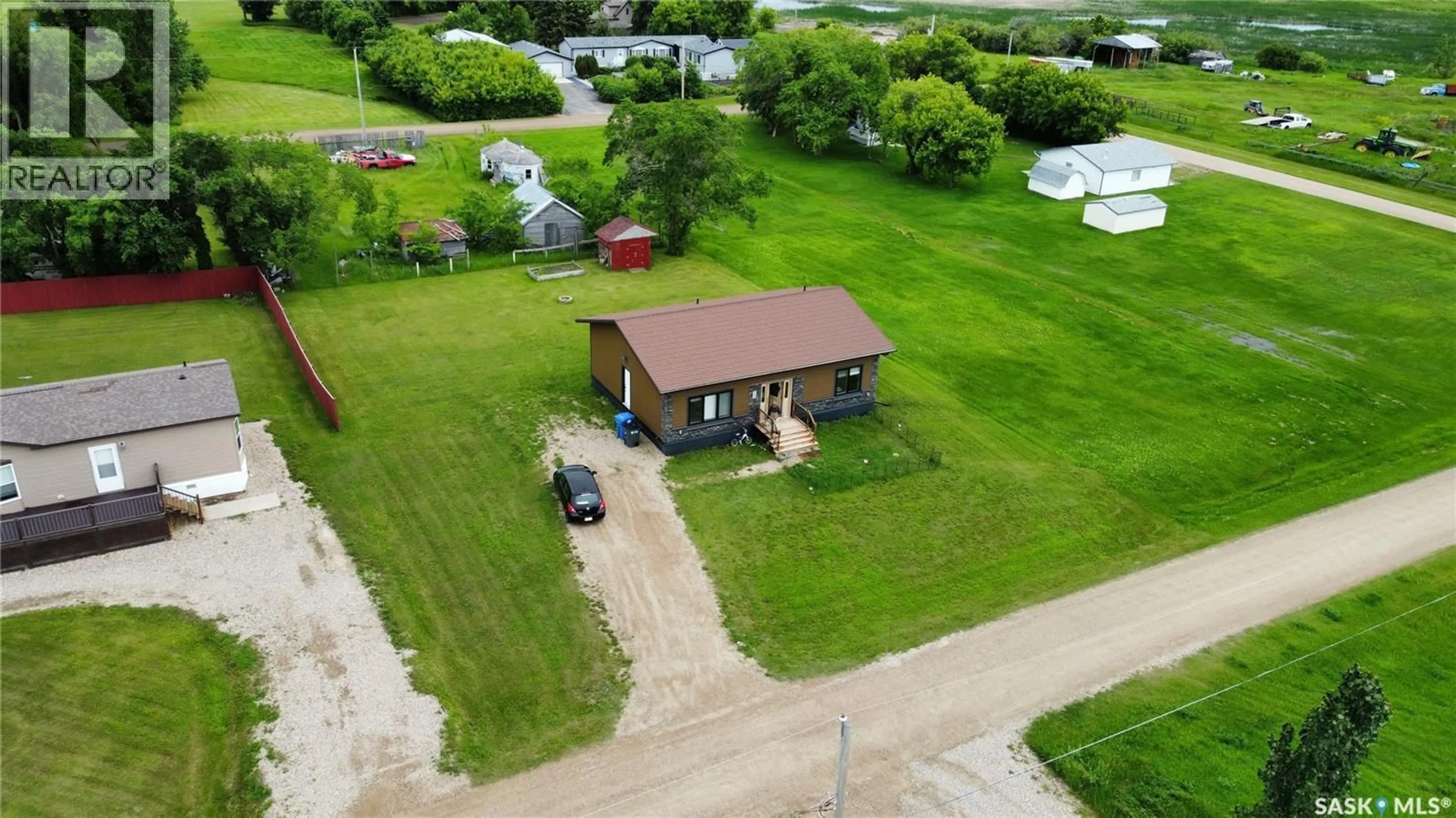 A pic from outside/outdoor area/front of a property/back of a property/a pic from drone, building for 207 SPRUCE STREET, Wolseley Saskatchewan S0G5H0