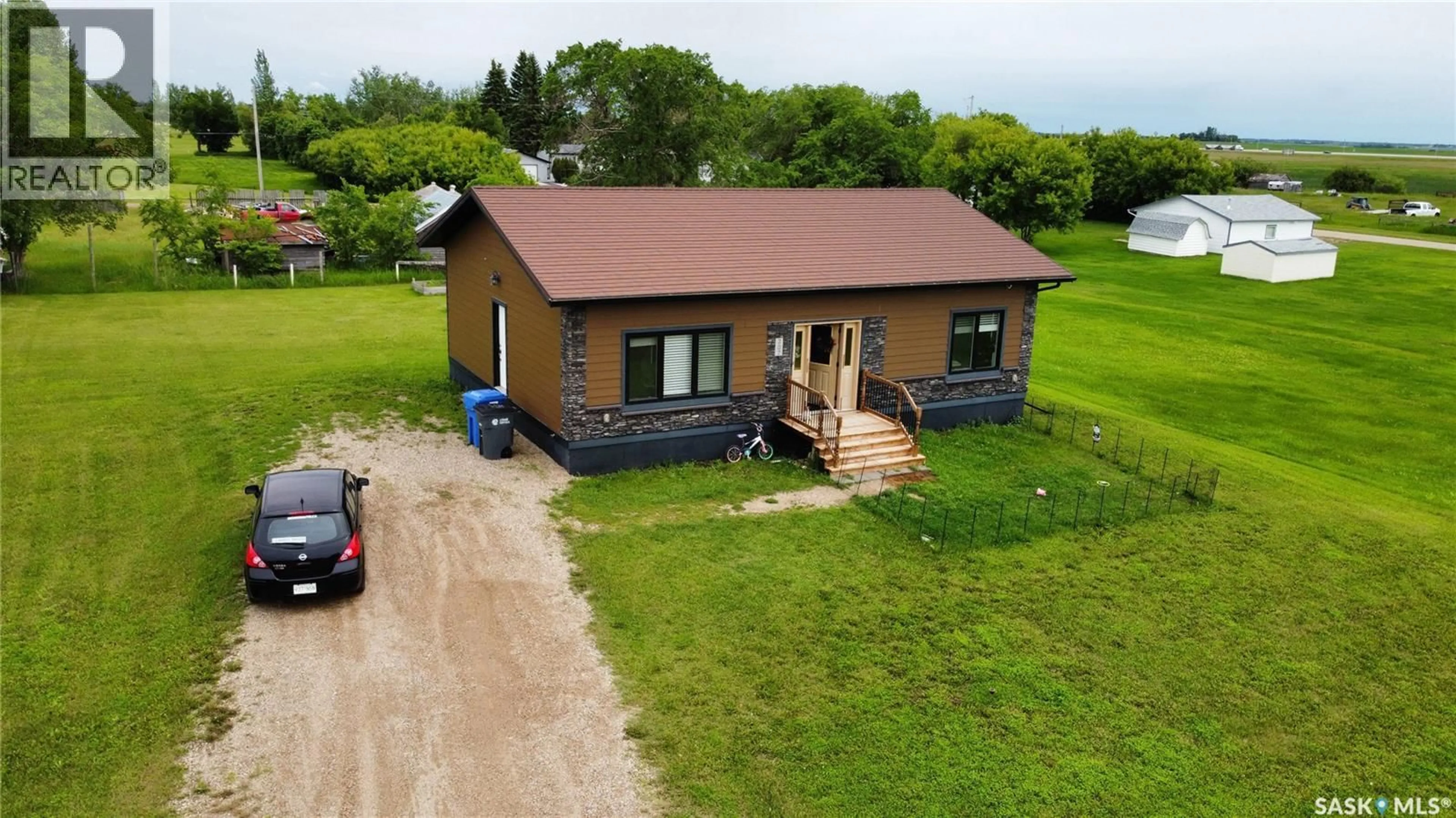 A pic from outside/outdoor area/front of a property/back of a property/a pic from drone, building for 207 SPRUCE STREET, Wolseley Saskatchewan S0G5H0