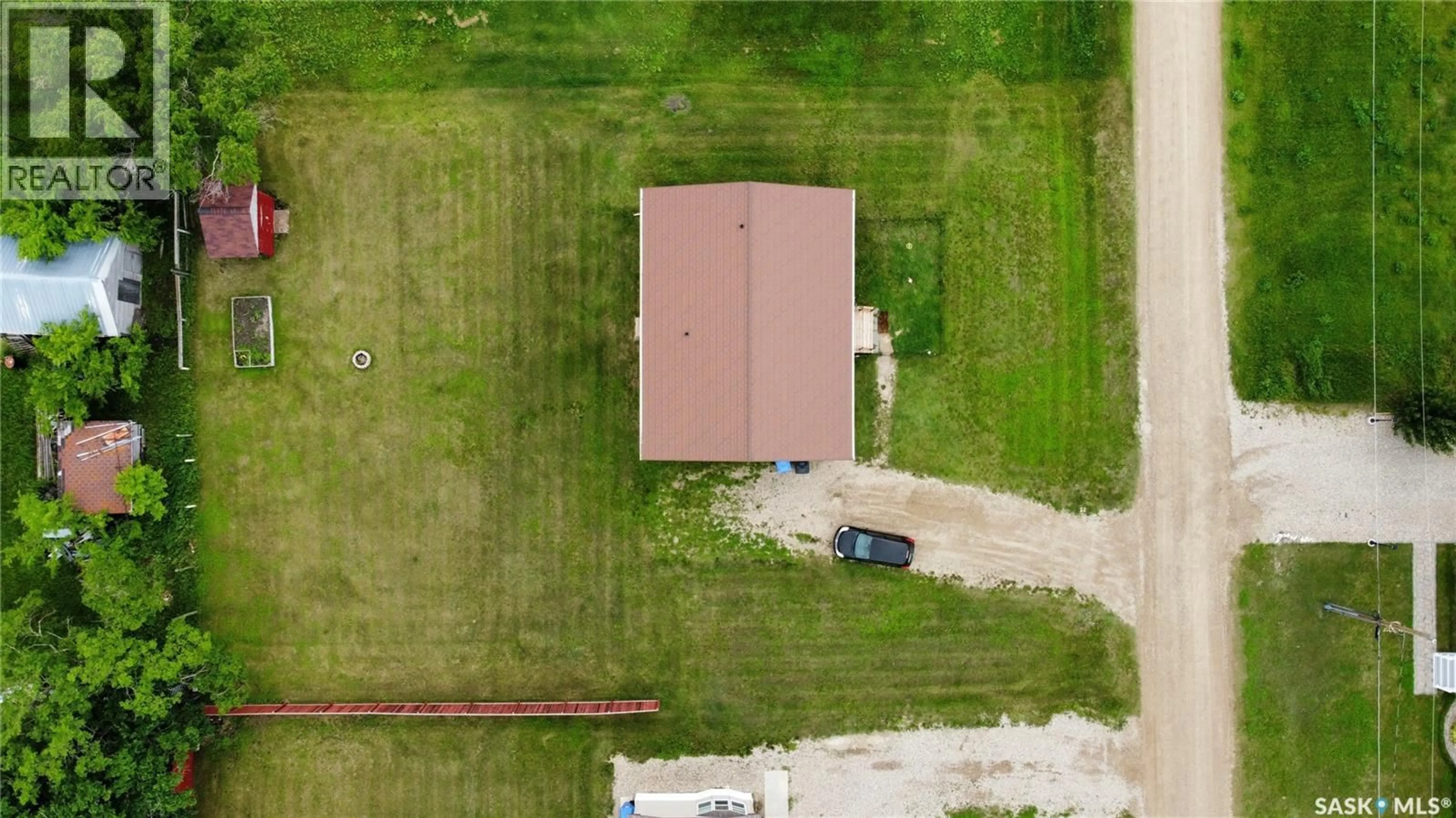 A pic from outside/outdoor area/front of a property/back of a property/a pic from drone, building for 207 SPRUCE STREET, Wolseley Saskatchewan S0G5H0