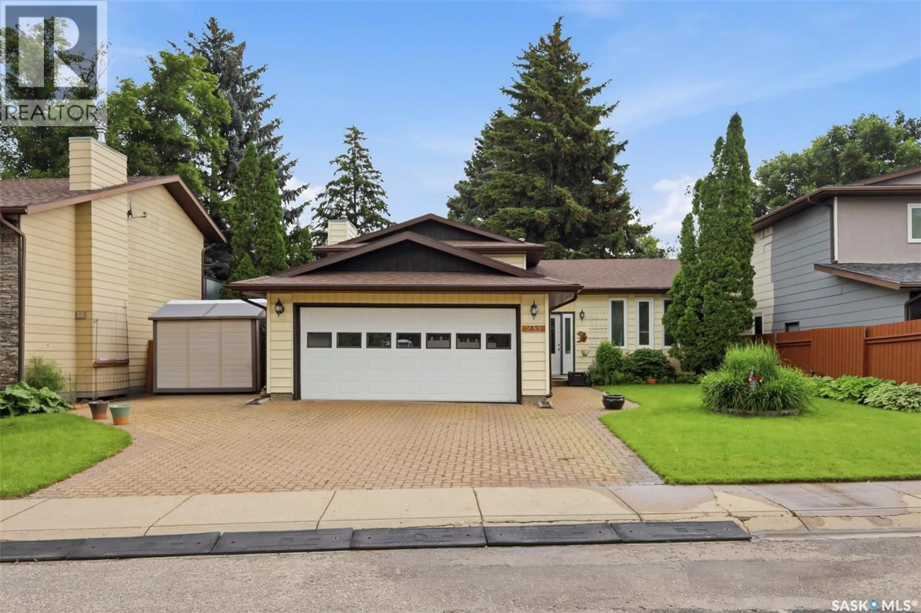 Home with vinyl exterior material, street for 233 KELLINS PLACE, Saskatoon Saskatchewan S7N2X5