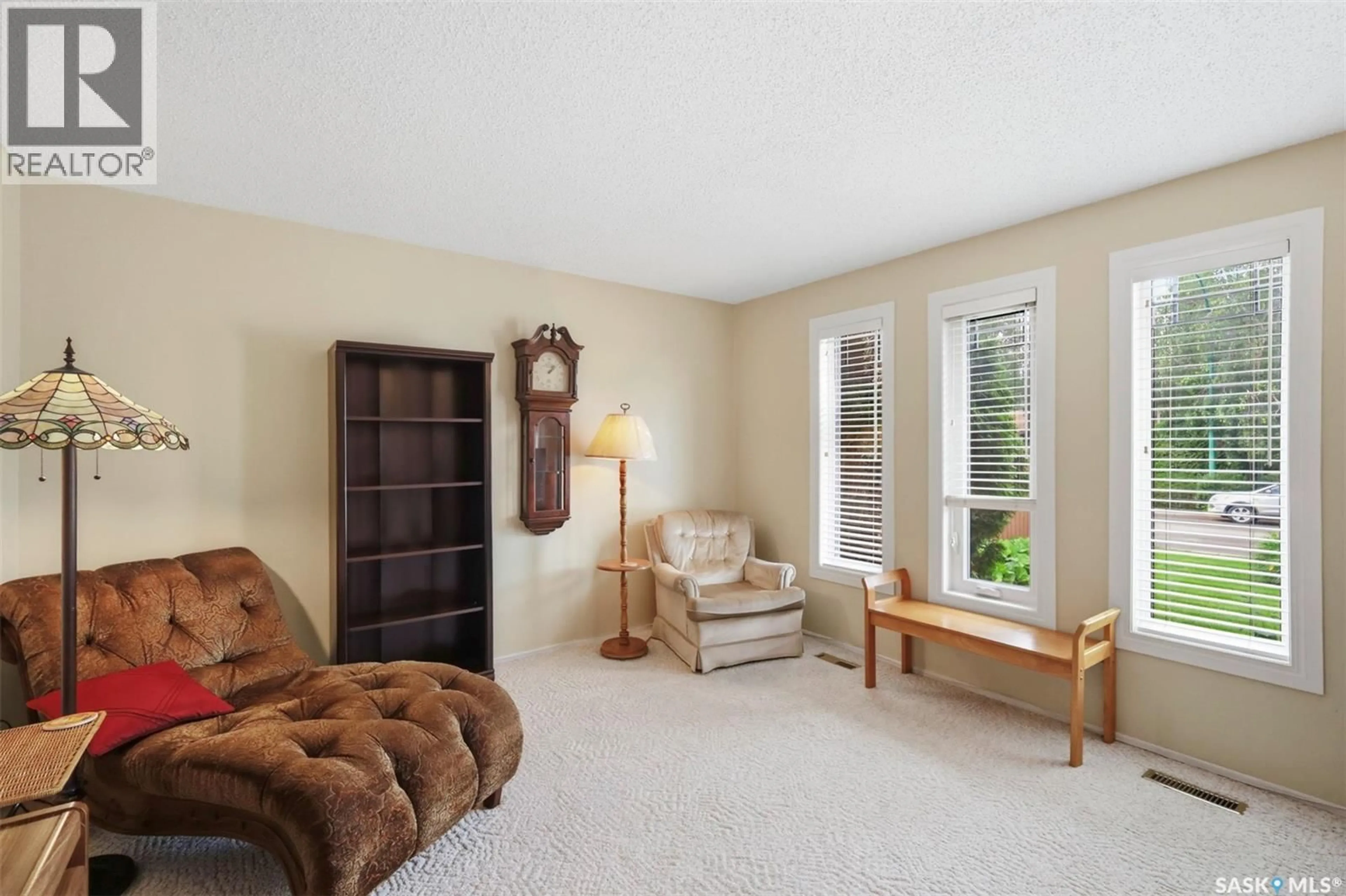 Living room with furniture, carpet floor for 233 KELLINS PLACE, Saskatoon Saskatchewan S7N2X5