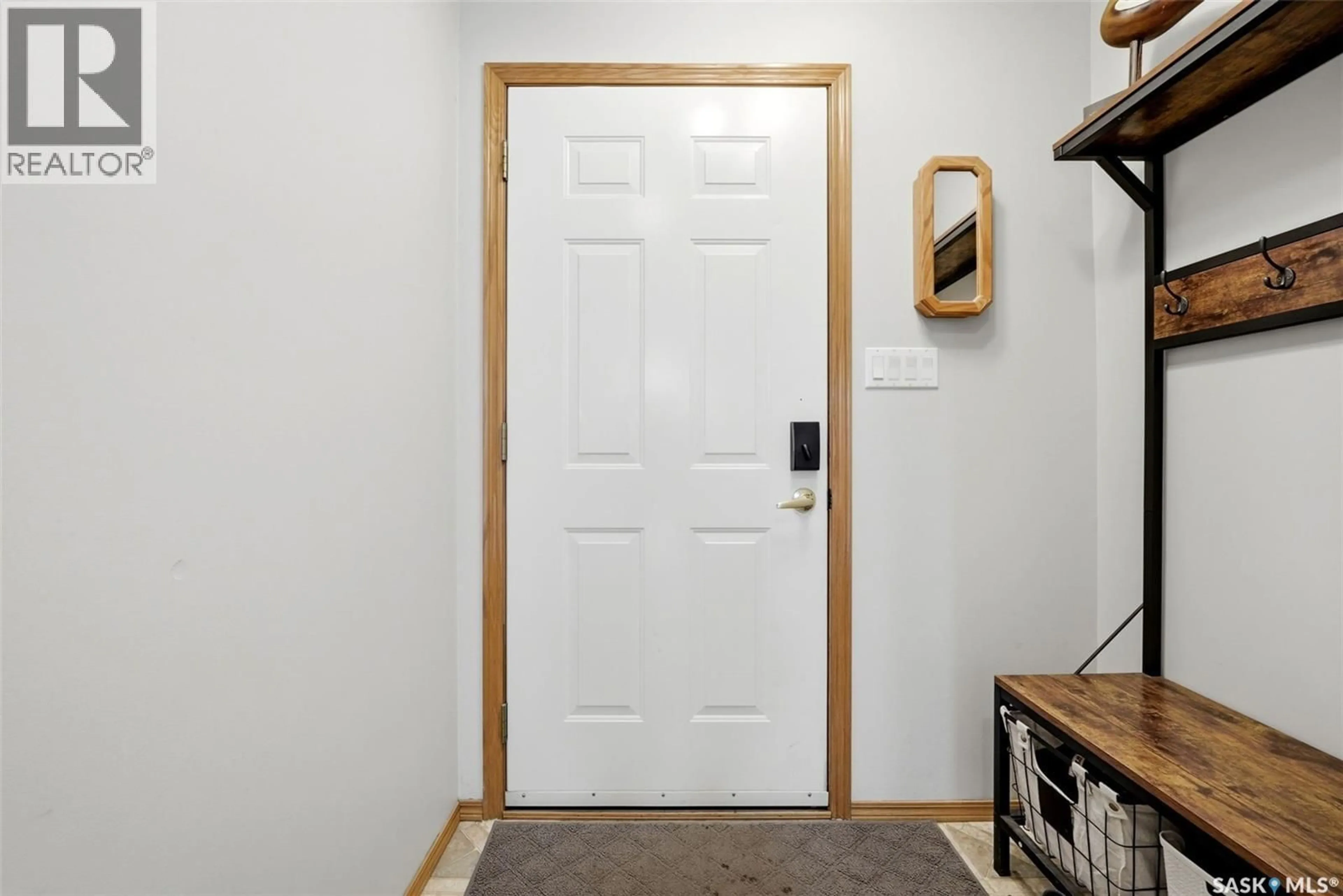 Indoor entryway for 105 COURTSIDE CRESCENT, Pilot Butte Saskatchewan S0G3Z0