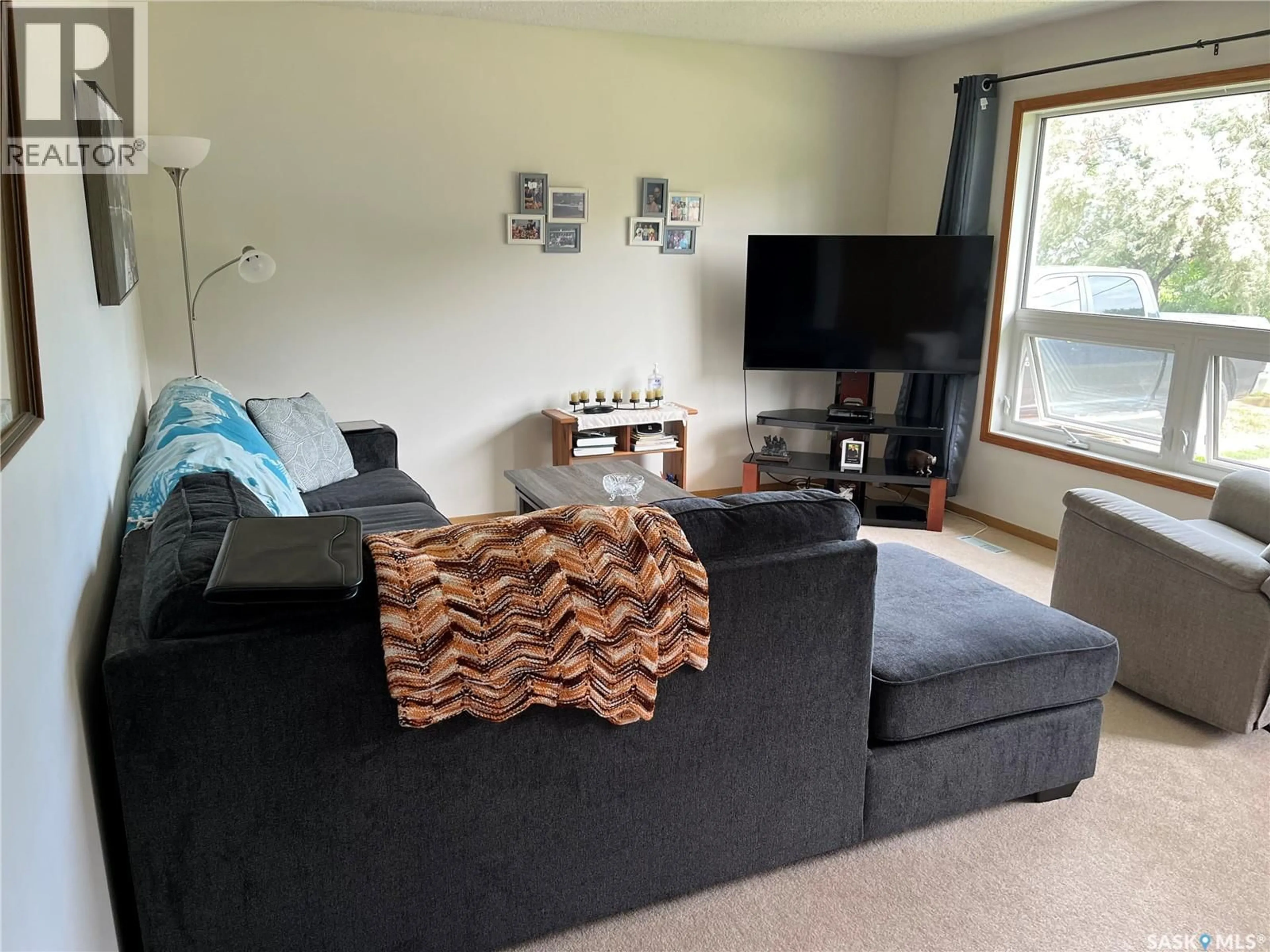 Living room with furniture, unknown for 2 6TH STREET, Willow Bunch Saskatchewan S0H4K0
