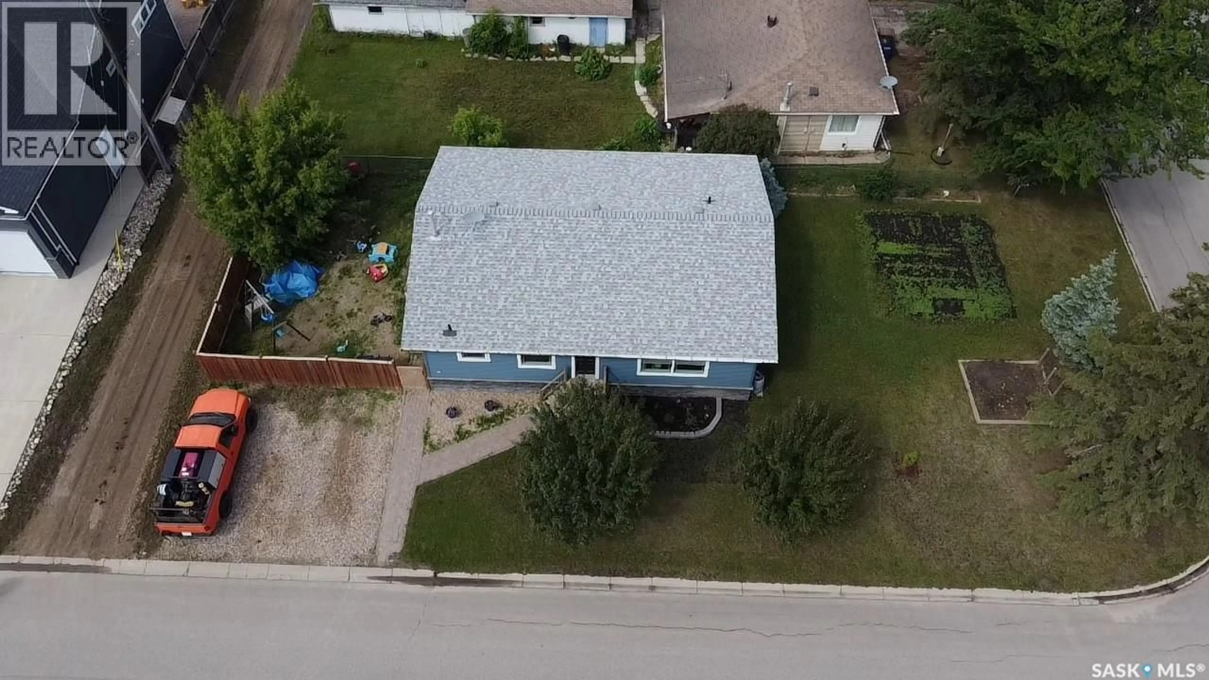 A pic from outside/outdoor area/front of a property/back of a property/a pic from drone, building for 1101 94TH STREET, Tisdale Saskatchewan S0E1T0