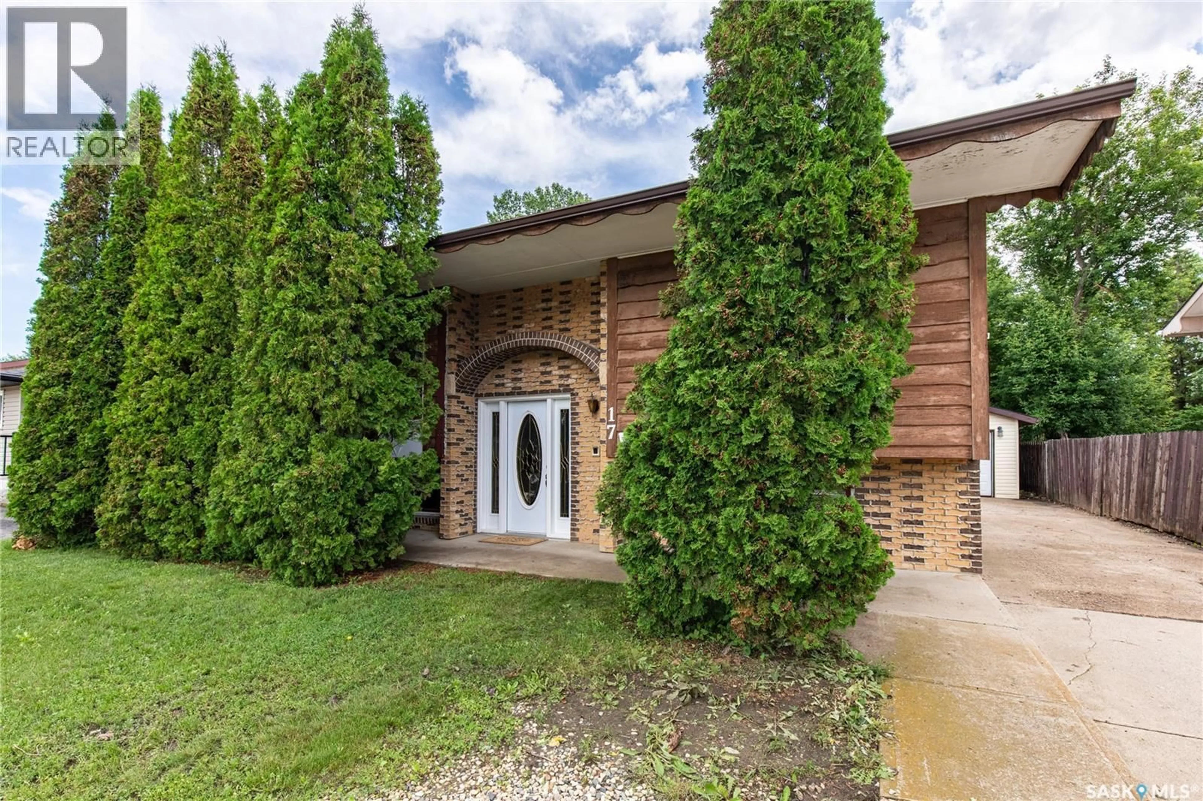 Home with brick exterior material, street for 17 BLUE SAGE DRIVE, Moose Jaw Saskatchewan S6J1A5