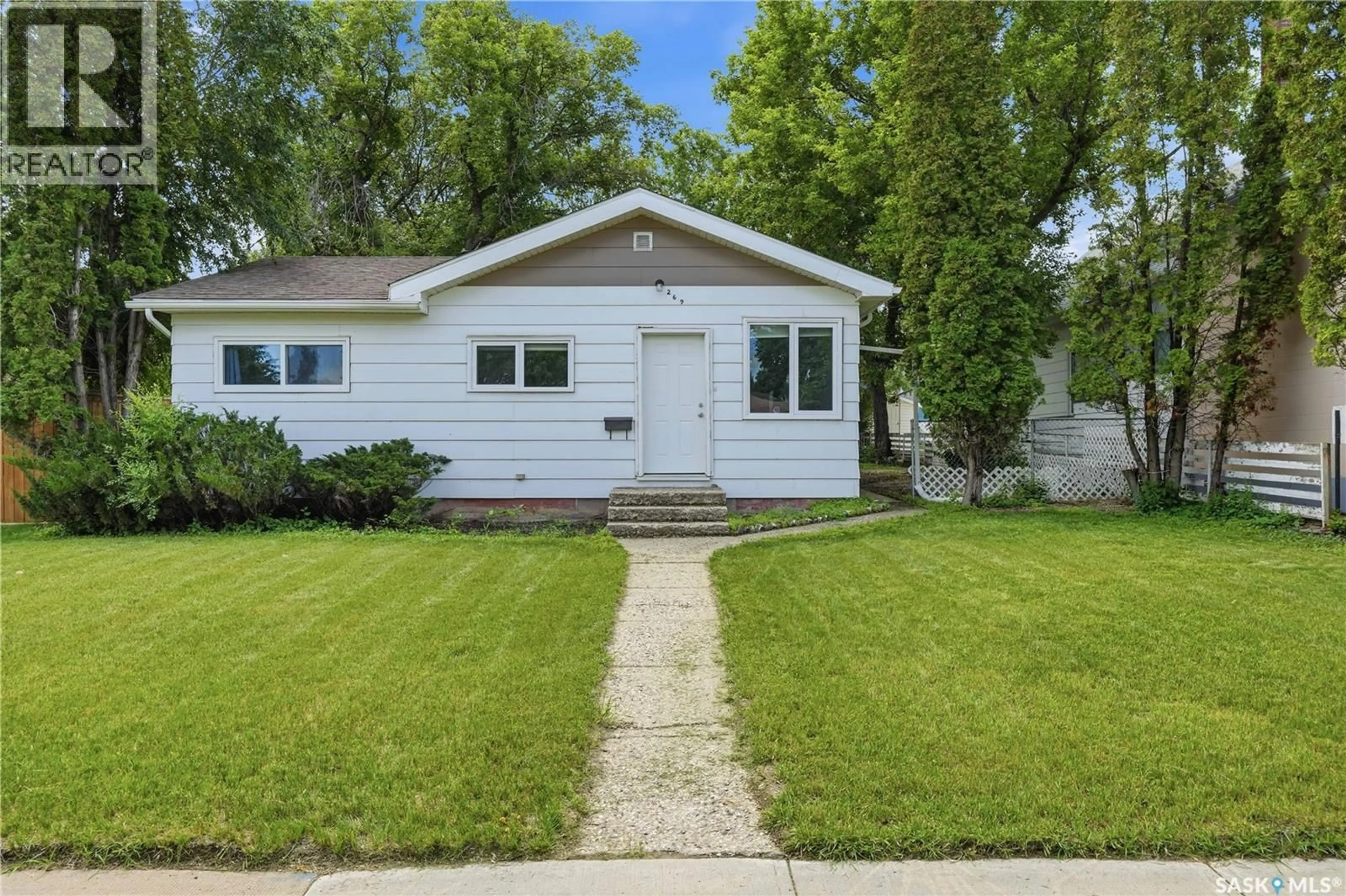 Home with vinyl exterior material, street for 269 IROQUOIS STREET, Moose Jaw Saskatchewan S6H5A8