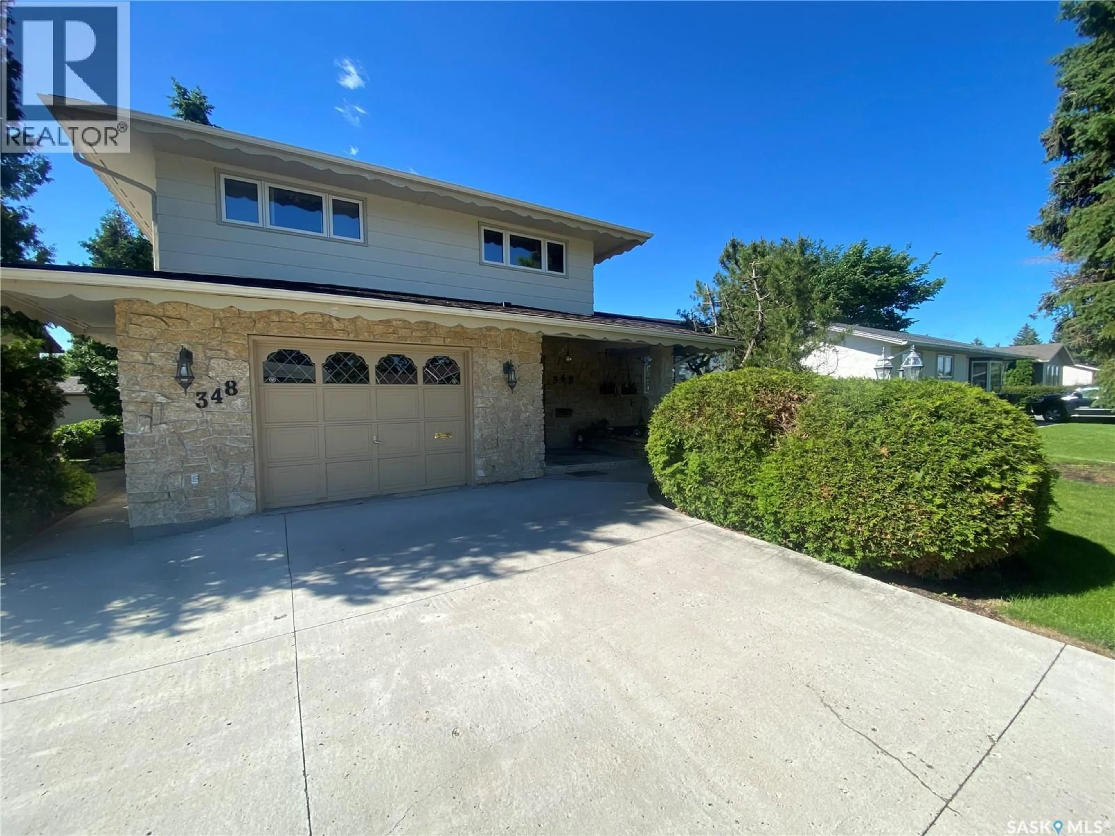 A pic from outside/outdoor area/front of a property/back of a property/a pic from drone, street for 348 WELLINGTON PARK ROAD, Yorkton Saskatchewan S3N3B7