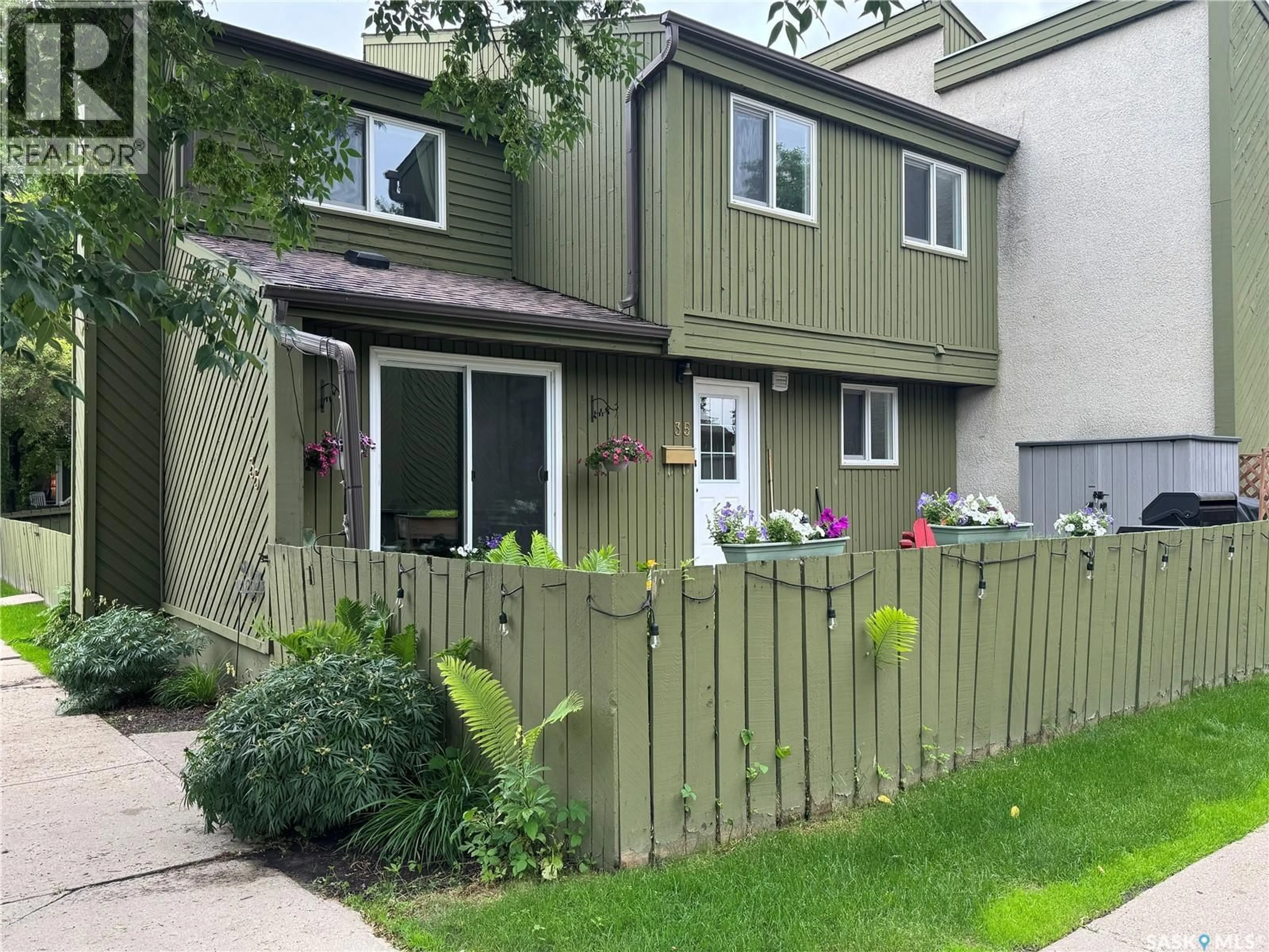 Home with vinyl exterior material, street for 35 215 PRIMROSE DRIVE, Saskatoon Saskatchewan S7K5H9