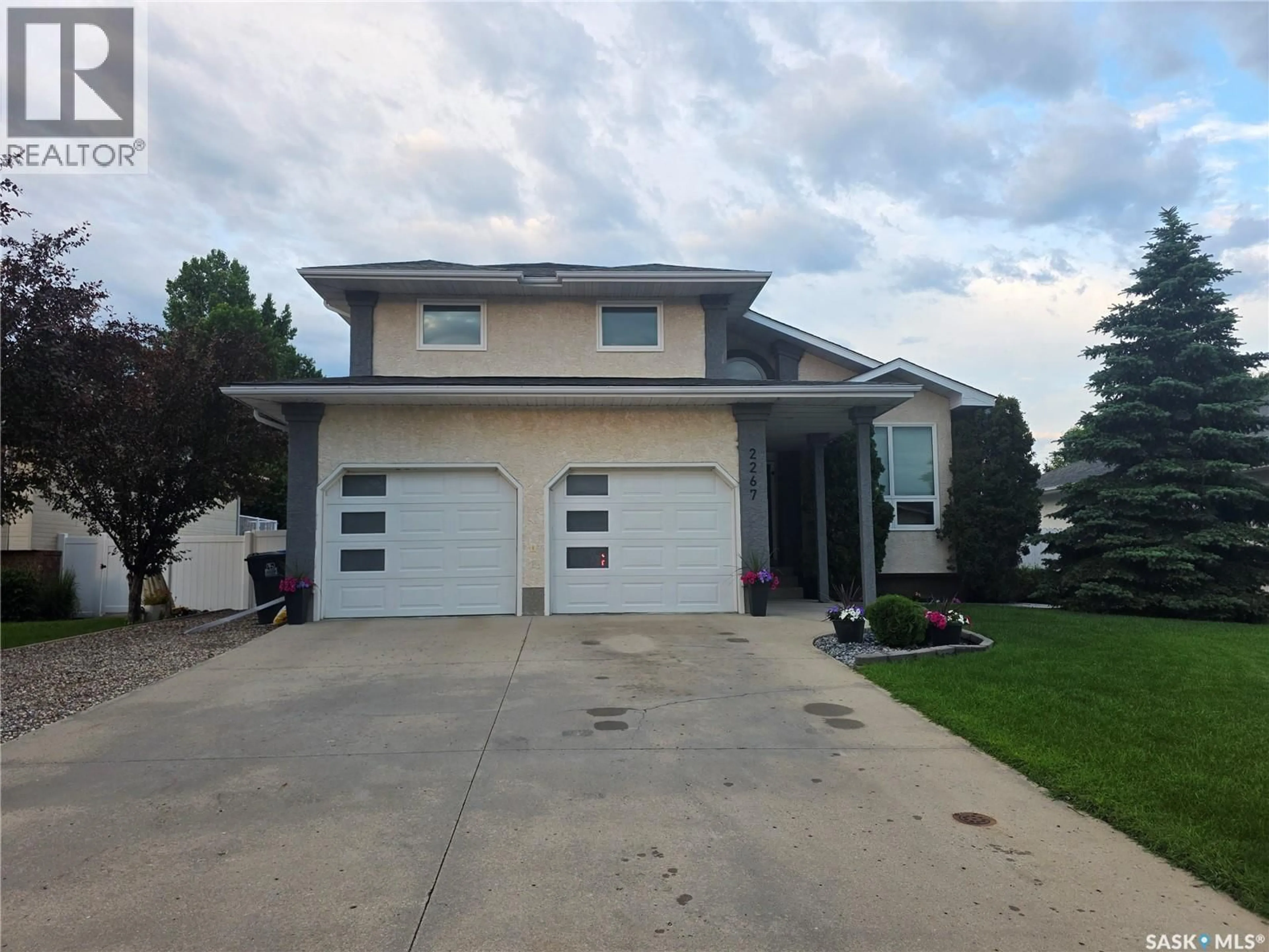 Home with vinyl exterior material, street for 2267 NEWCOMBE DRIVE, Estevan Saskatchewan S4A2S6