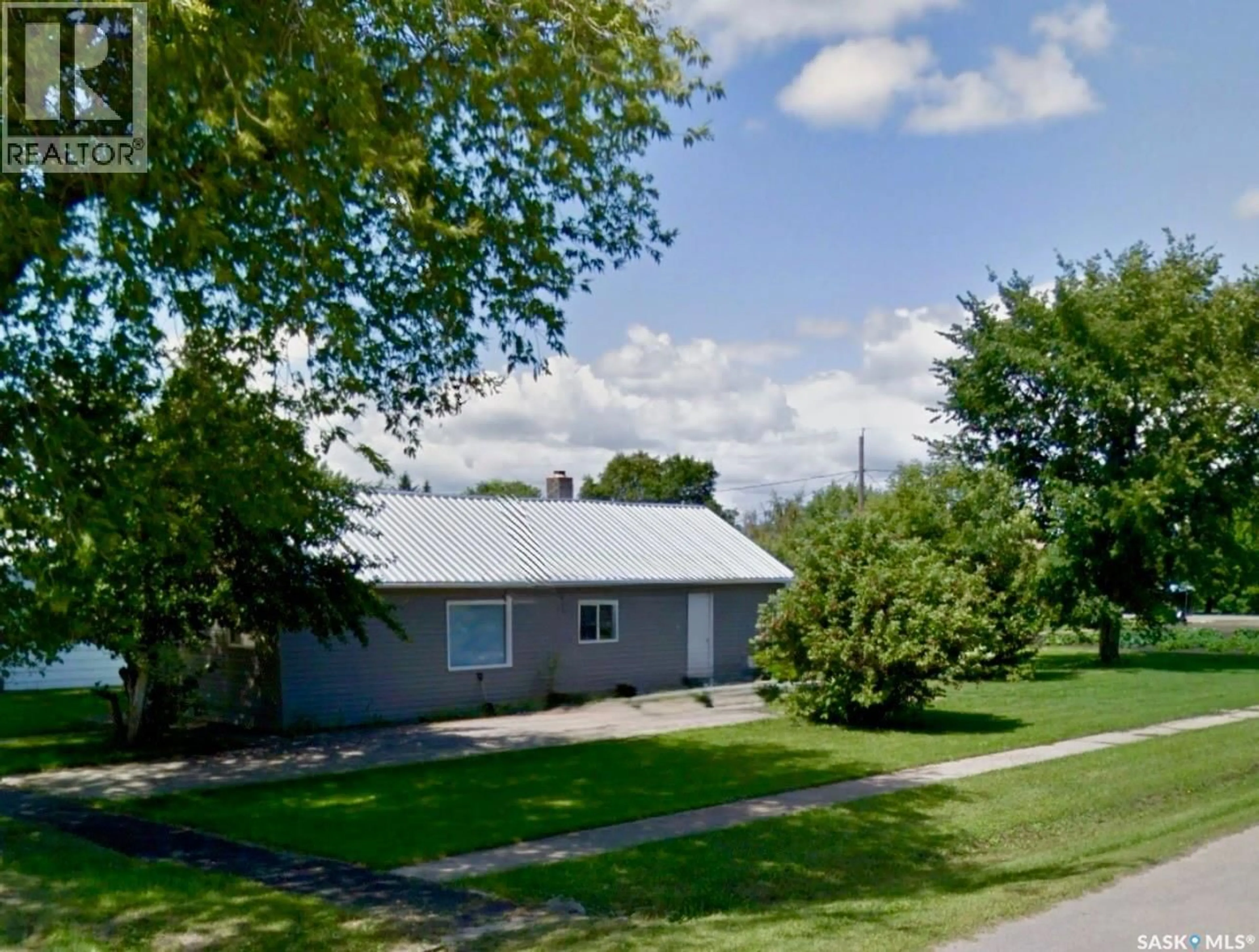 A pic from outside/outdoor area/front of a property/back of a property/a pic from drone, street for 200 2ND STREET, Wakaw Saskatchewan S0K4P0