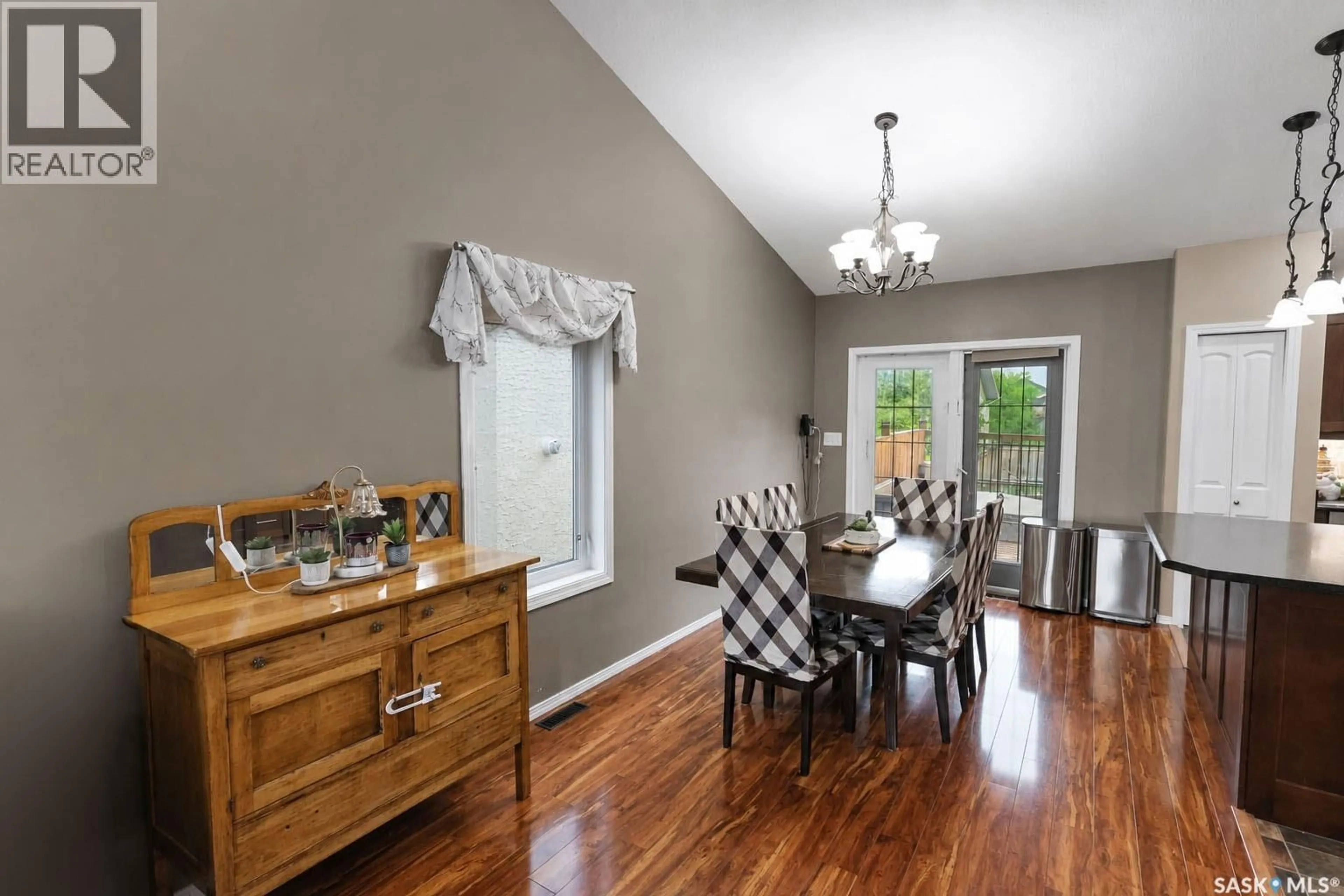 Dining room, wood/laminate floor for 22 GILLINGHAM CRESCENT, Prince Albert Saskatchewan S6X0A5