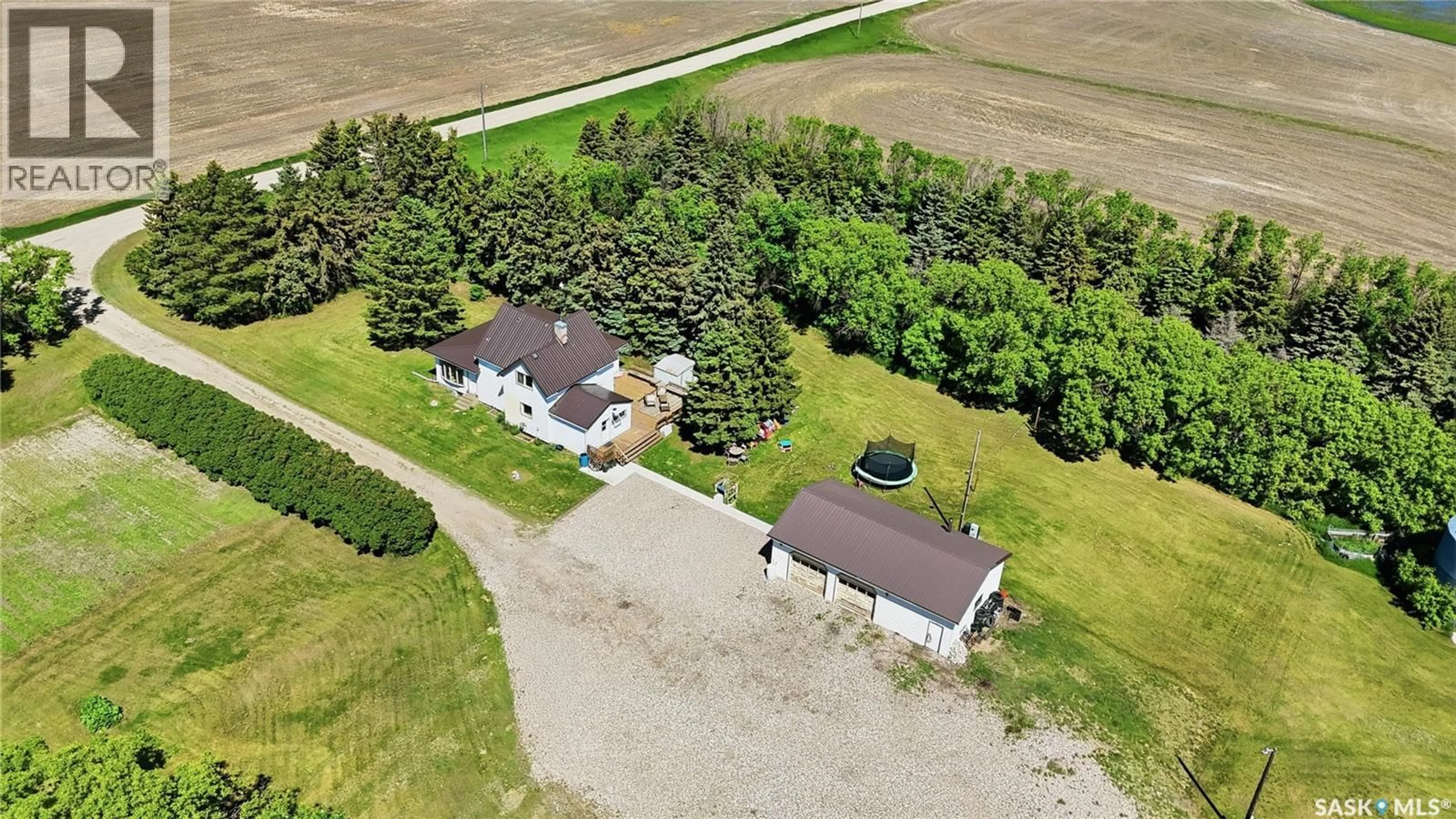 A pic from outside/outdoor area/front of a property/back of a property/a pic from drone, street for WATROUS WEST ACREAGE, Morris Rm No. 312 Saskatchewan S0K4Y0