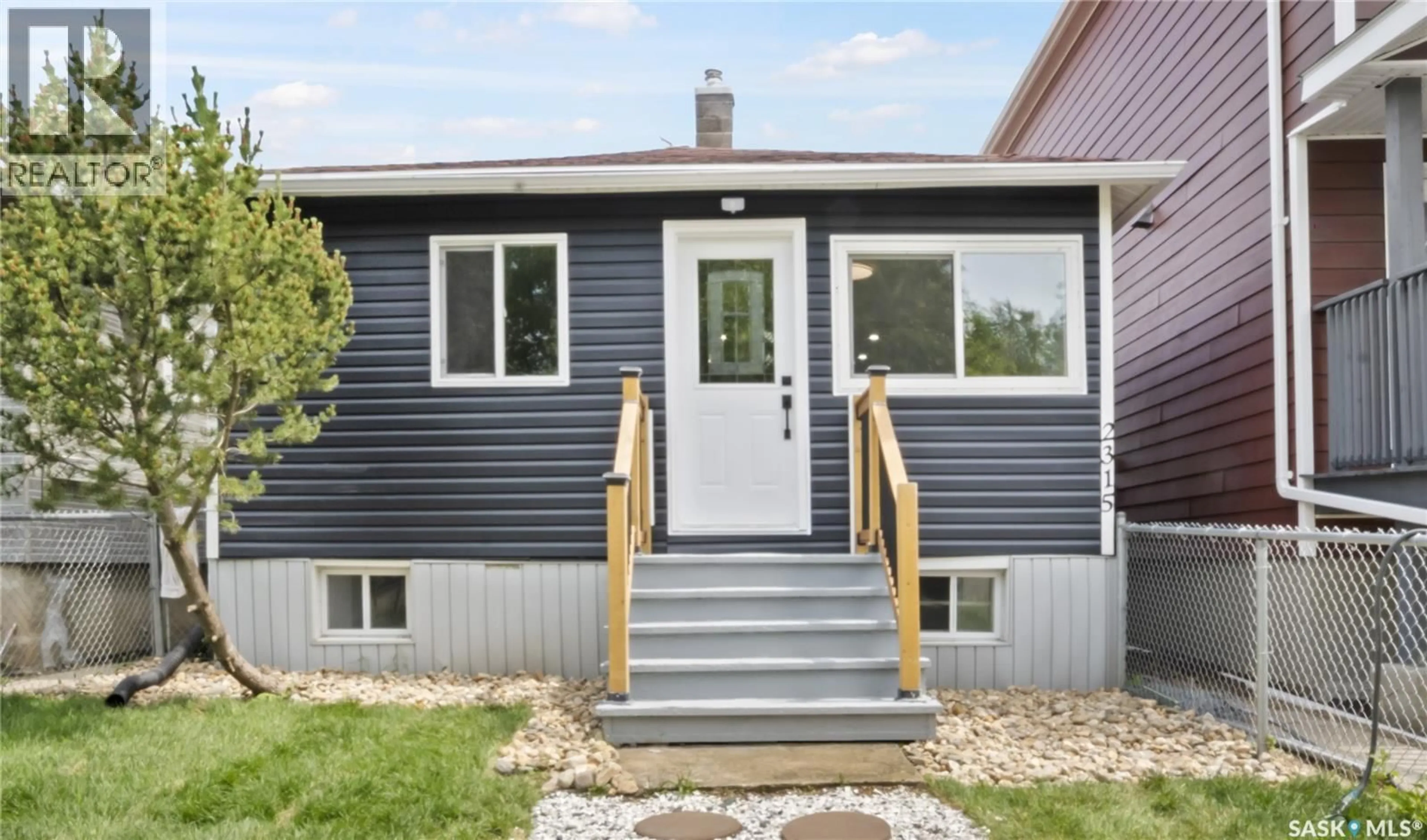 Home with vinyl exterior material, street for 2315 FRANCIS STREET, Regina Saskatchewan S4N2P8