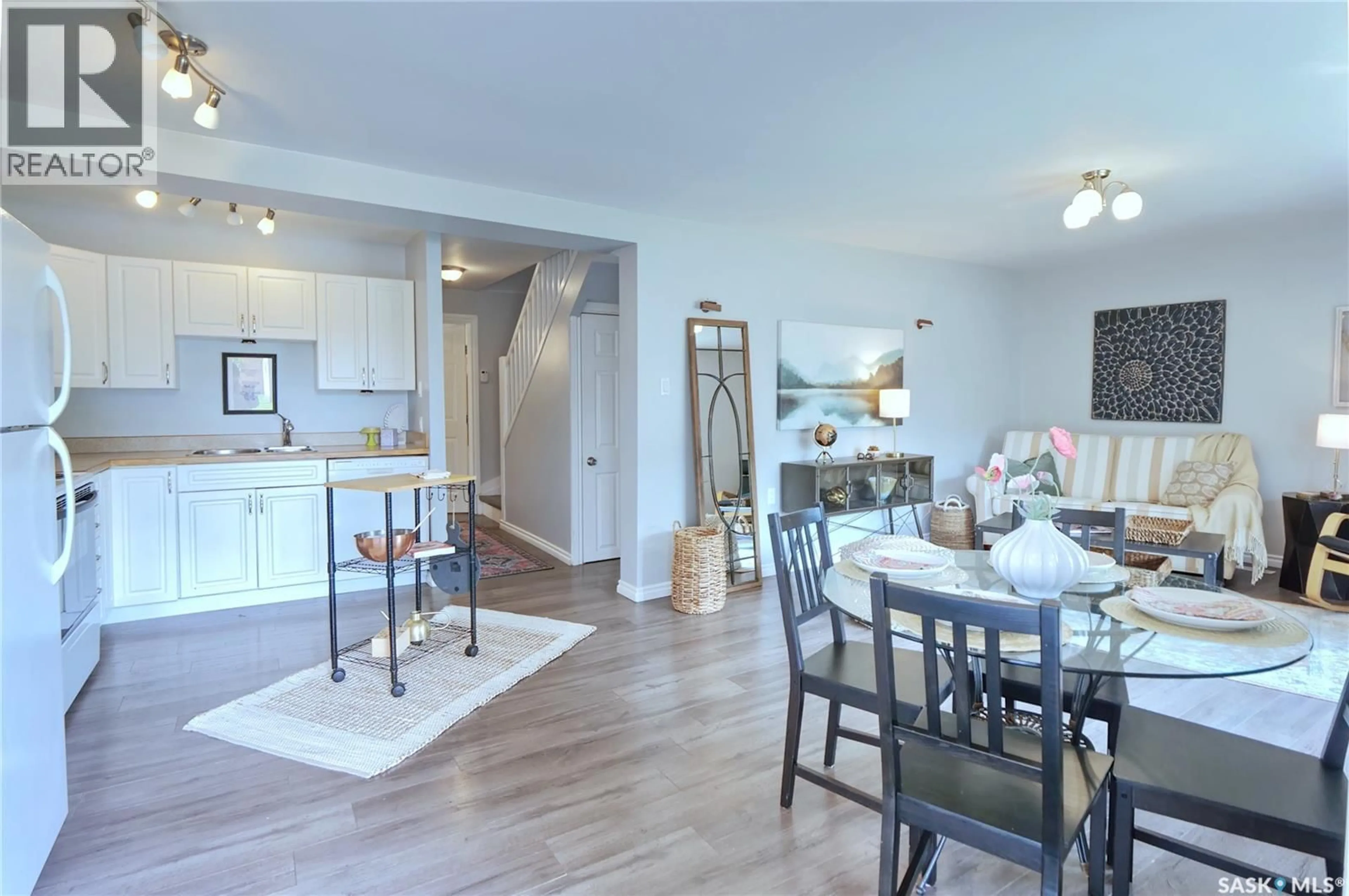 Open concept kitchen, wood/laminate floor for 568 ATHABASCA STREET E, Moose Jaw Saskatchewan S6H0M1
