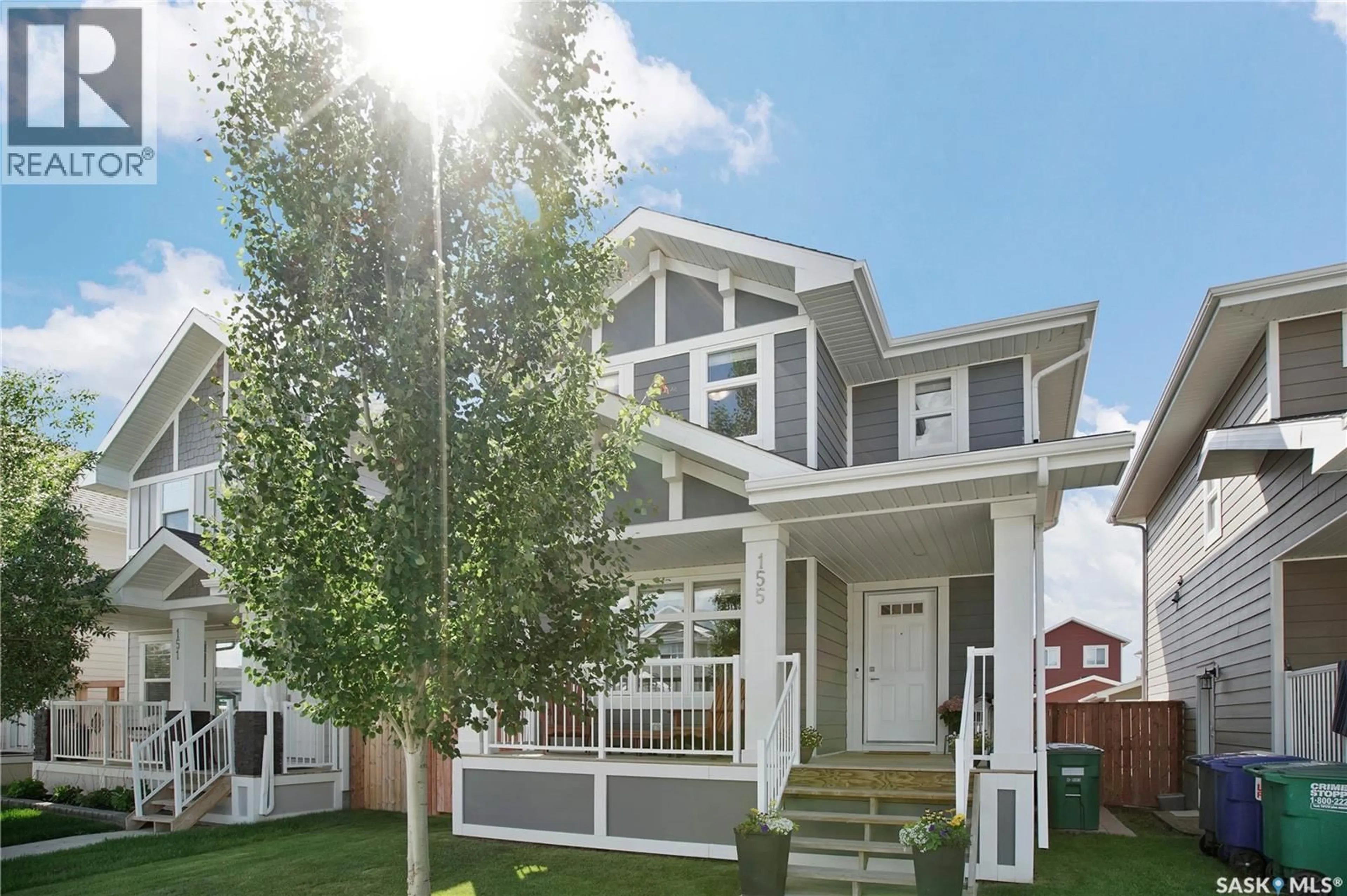 Home with vinyl exterior material, street for 155 STILLING MEWS, Saskatoon Saskatchewan S7V0P3