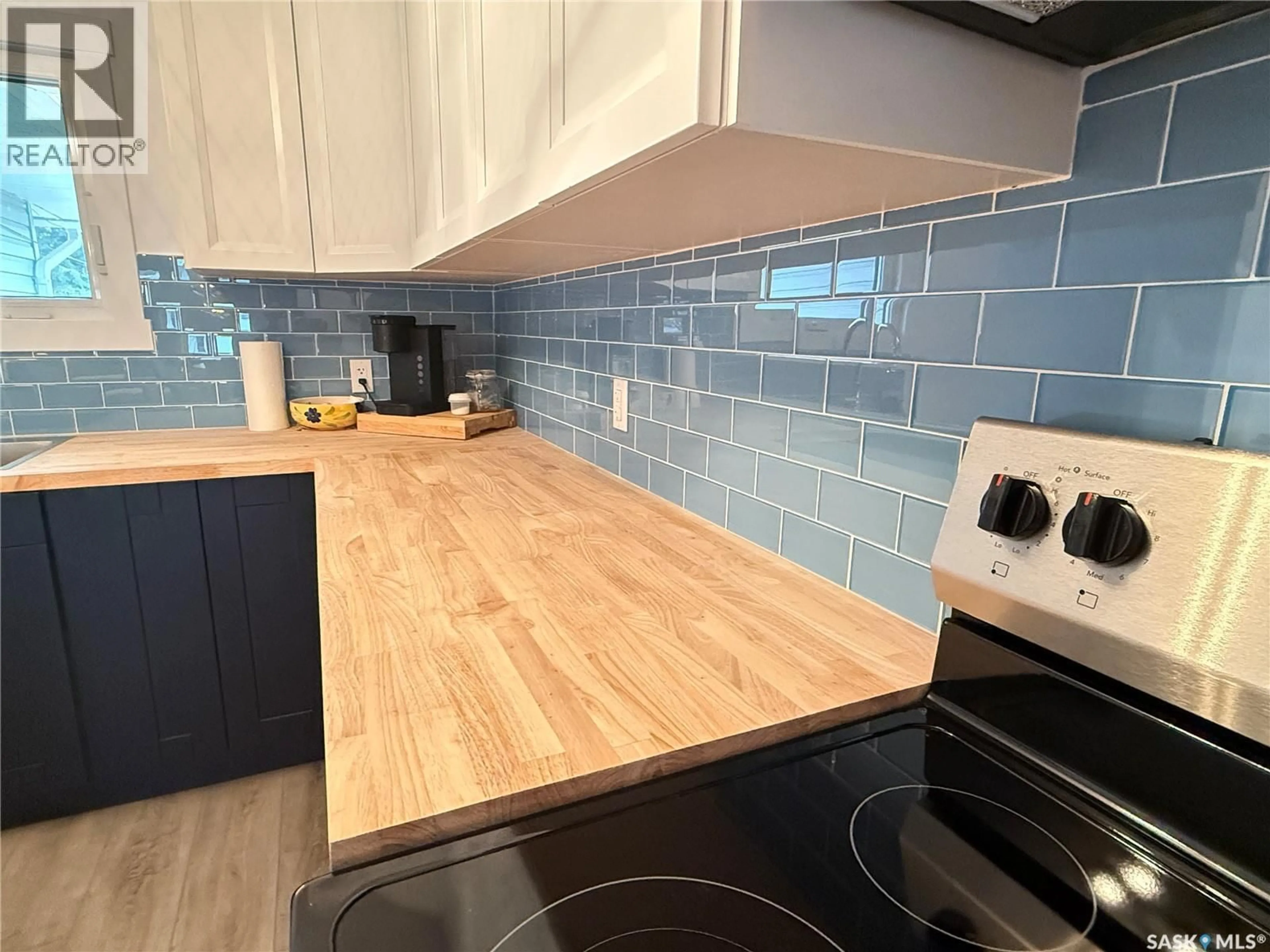Contemporary kitchen, ceramic/tile floor for 615 WINDSOR STREET, Weyburn Saskatchewan S4H0X1