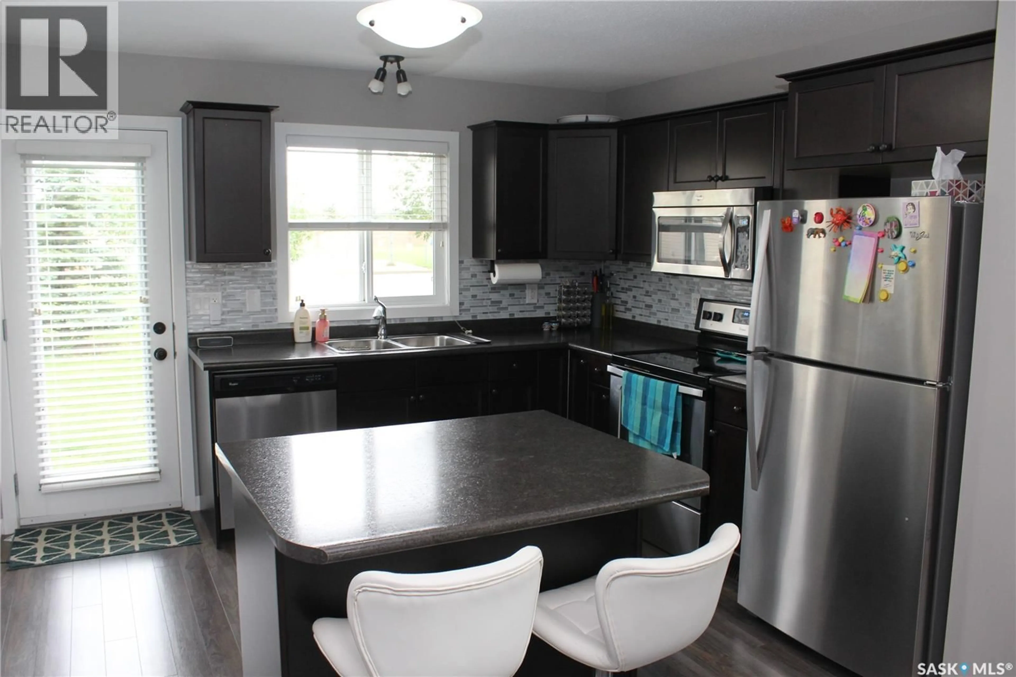 Open concept kitchen, unknown for 4850 - 56 HARBOUR LANDING DRIVE, Regina Saskatchewan S4W0K9